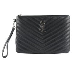 Used Saint Laurent YSL Black Calfskin Matelasse Chevron Monogram A5 Wristlet Bag