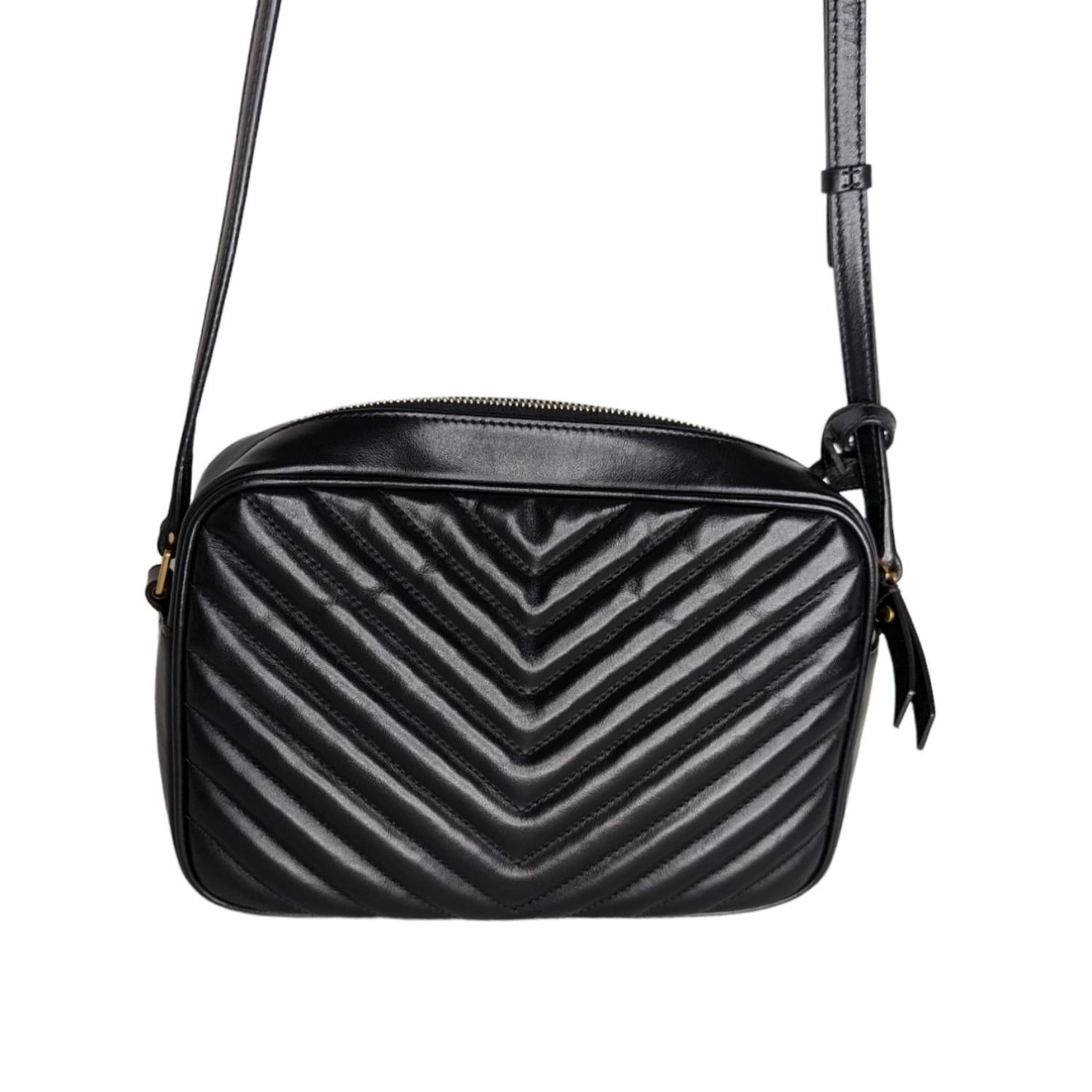 Inspired by vintage camera bags, this chic crossbody features elegant matelassé stitching, tonal logo-monogram hardware and a dramatic tassel at one side. Made in Italy.

French designer Yves Saint Laurent revolutionized the '60s and '70s with his