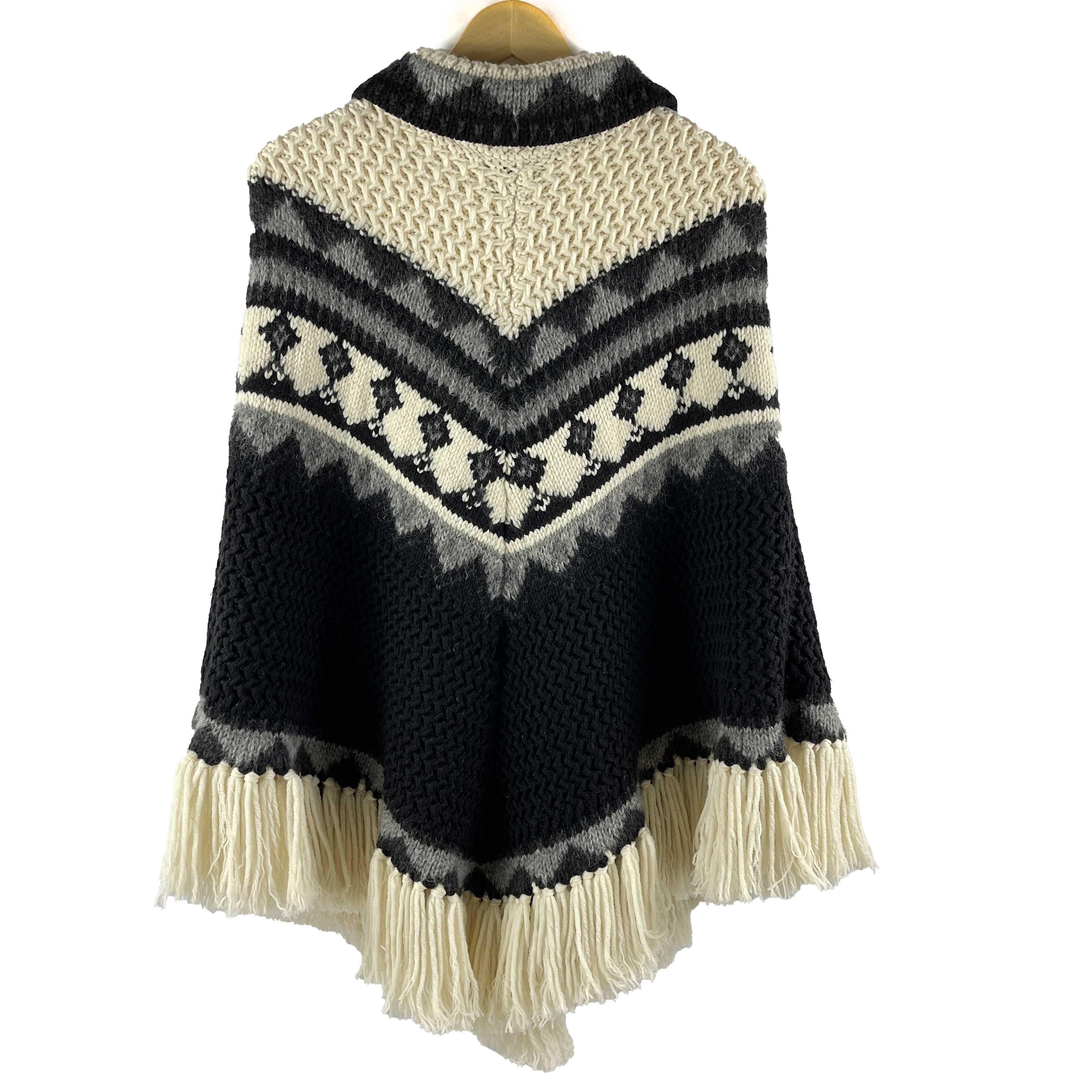 Saint Laurent - Pristine - Fringe Knit Pom Pom Tassel Poncho - Black, Gray, Ivory - XS S M - Top

Description

This Saint Laurent poncho is crafted with a wool blend and features varied knit textures and designs throughout.
It also contains a