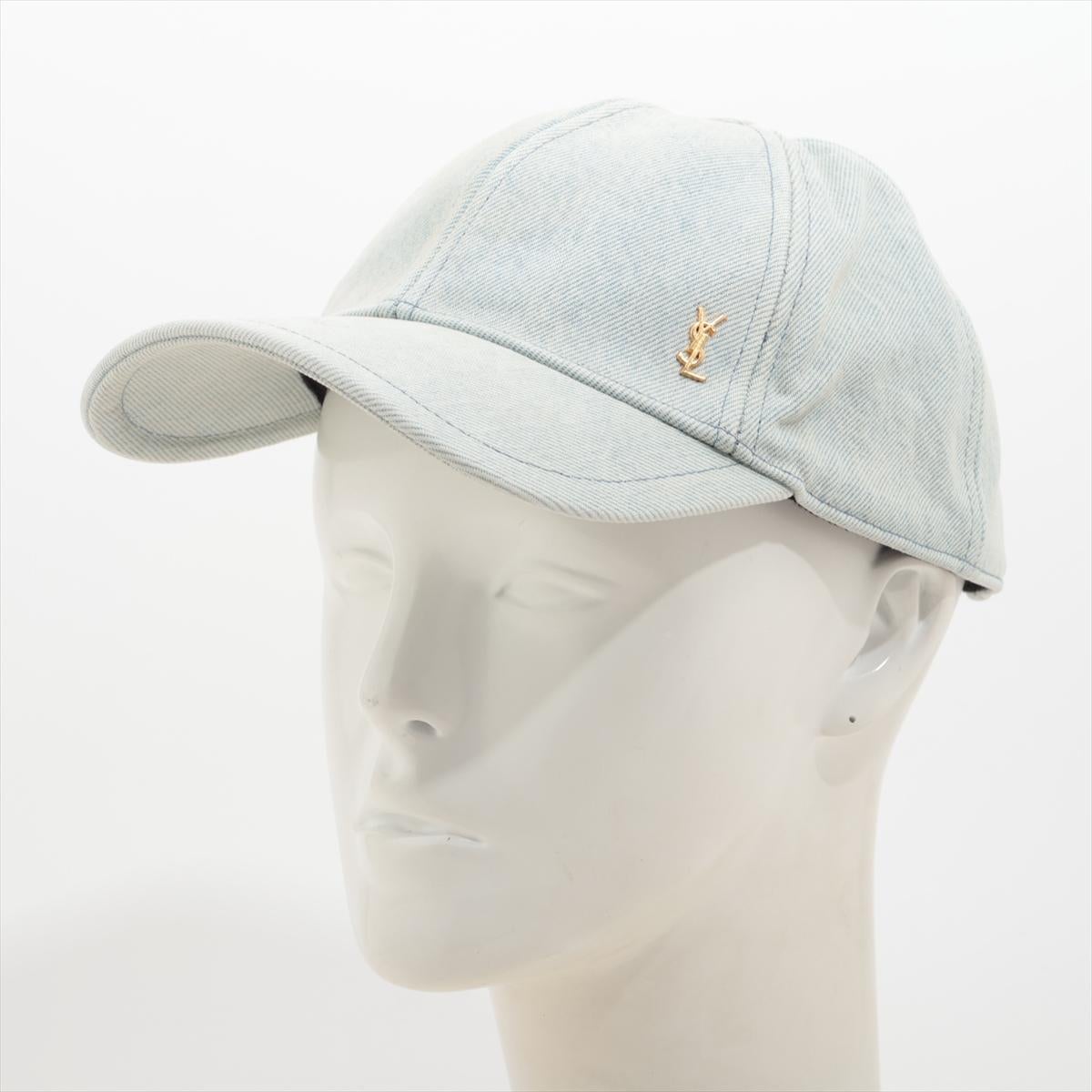 The Saint Laurent YSL Logo Cap in Denim is a stylish and versatile accessory that blends casual elegance with luxury branding. Crafted from high-quality denim, the cap features iconic YSL small logo in gold-toned on the front, adding a bold yet