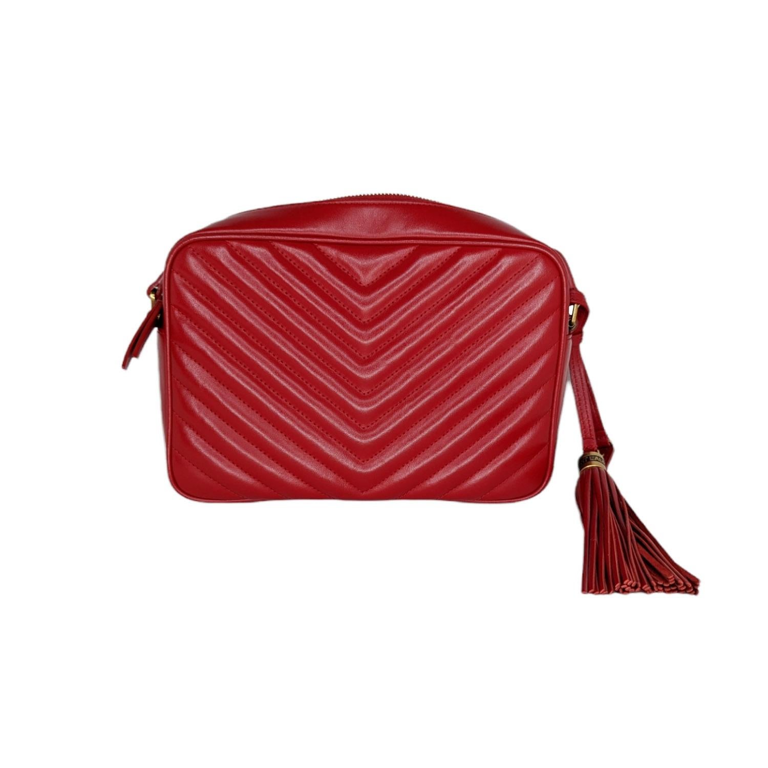 Inspired by vintage camera bags, this chic crossbody features elegant matelassé stitching, tonal logo-monogram hardware and a dramatic tassel at one side. Made in Italy. Retail price $1,450.

French designer Yves Saint Laurent revolutionized the