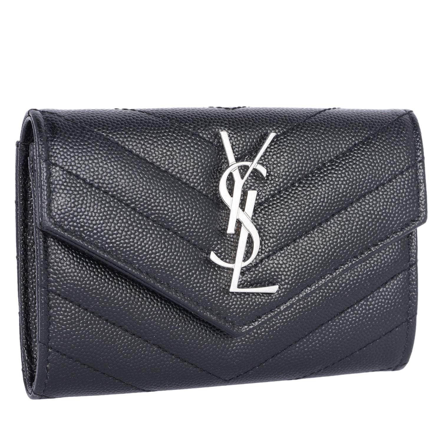 Authentic, pre-owned Saint Laurent YSL black small flap grained leather wallet. Features matelassé grained leather, envelope front flap with silver YSL logo, snap closure, back slip pocket, 4 cc interior slots and a open compartment.

Made in