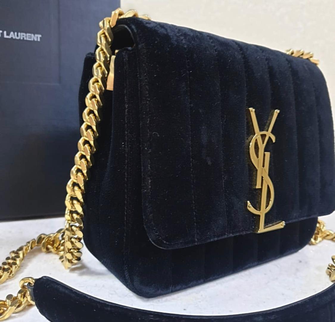 Brand: Saint Laurent

Size: Small (6.75 x 5.75 x 2.75 inch)

(15 * 17 * 7 cm)

Name: Vicky
Color: Black
Style: Crossbody
Material: Velvet

YSL monogram gold metal logo on front

Flap front with magnetic snap closure
Black soft velvet material

21
