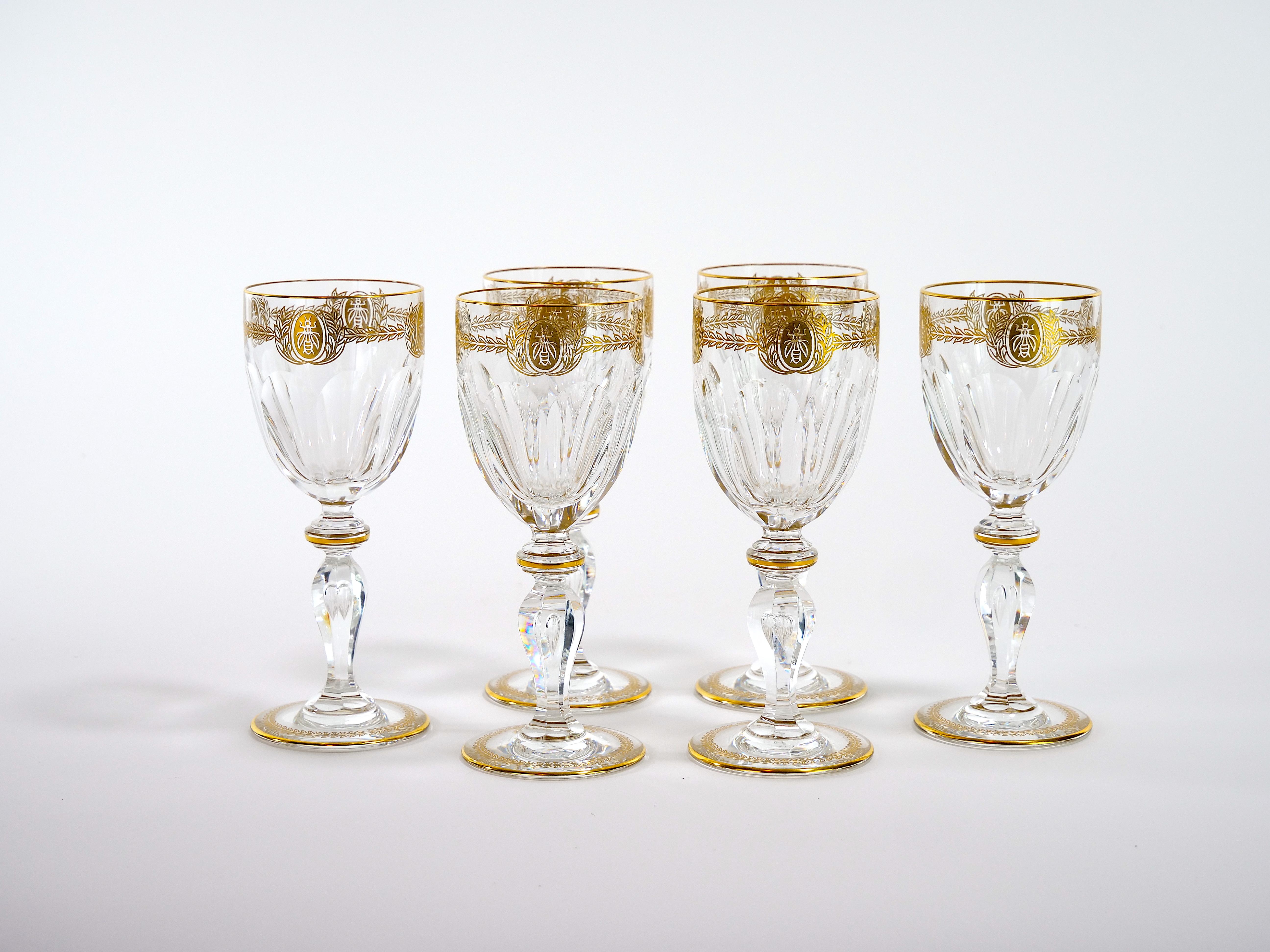 Richly hand cut and mouth blown with hand gilt gold bees design top details and stem garland wreath design barware and tableware glass service for 7 people. Each glass features a deep cuts that allow the light to retract and shine to a brilliant
