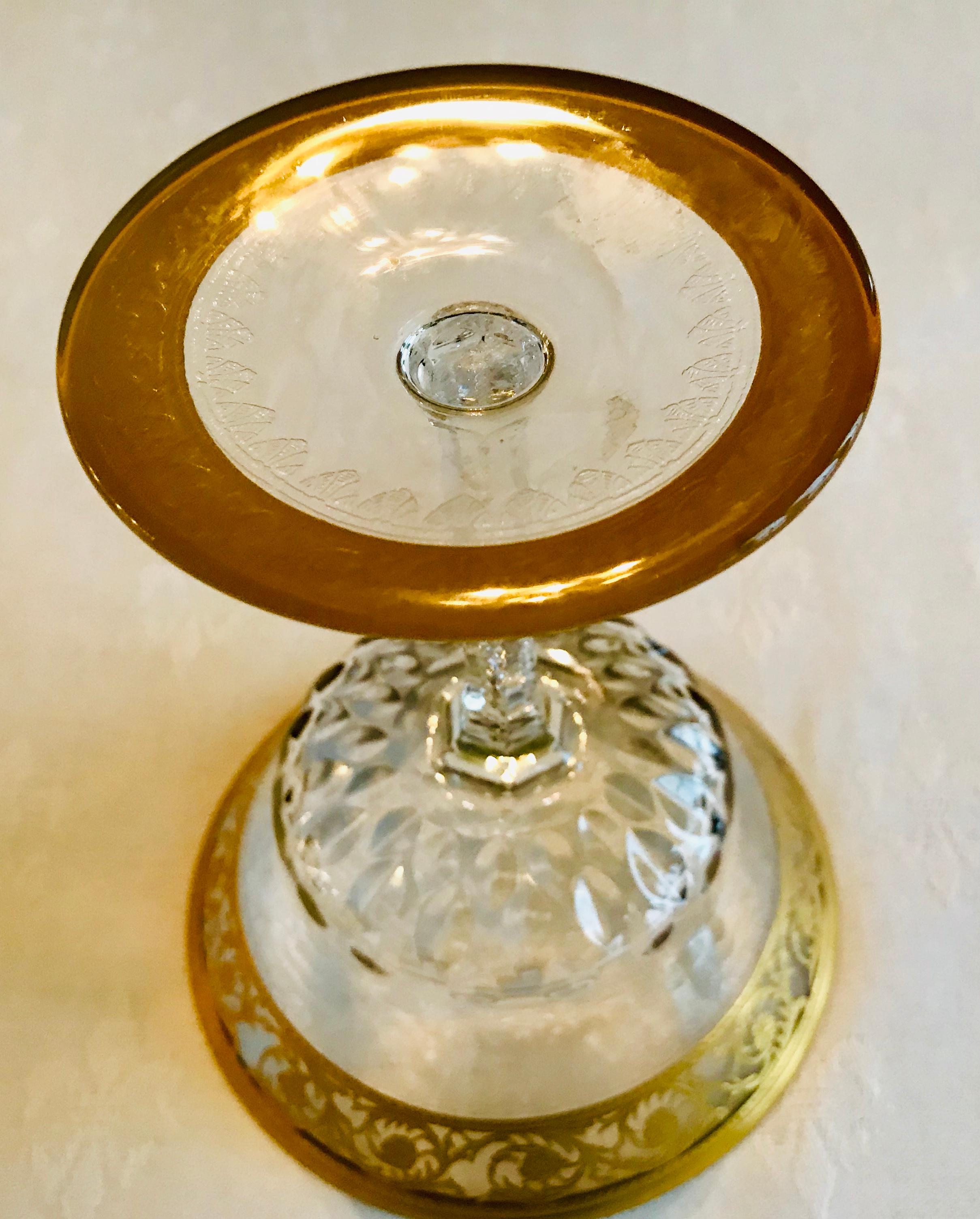 A Classic Saint Louis gold thistle champagne saucer in clear crystal, this item is in “like new” condition - never used.

This mouth blown, faceted and incised glass is heavily encrusted with gold after incising, then re-fired so the gold will not