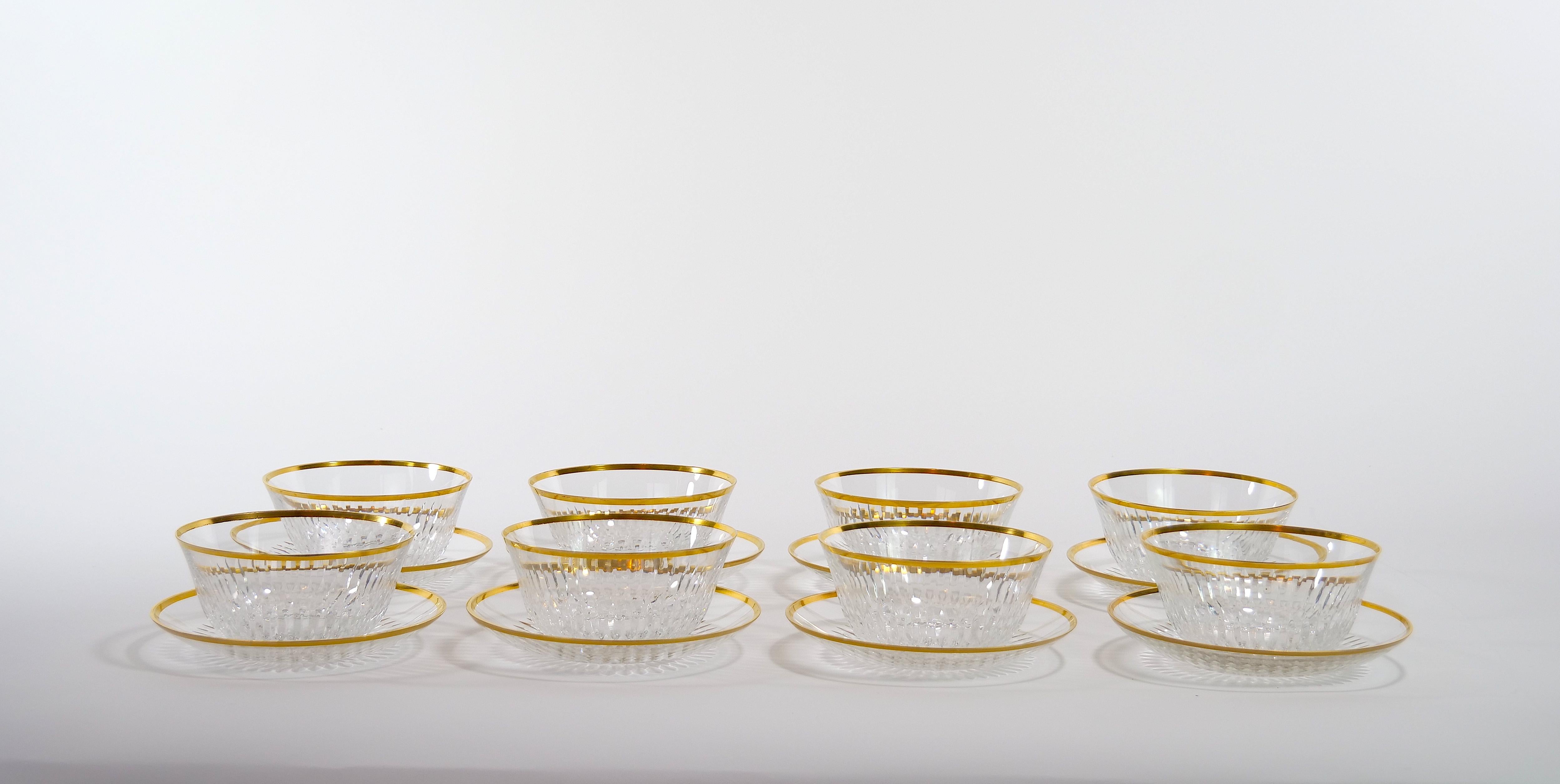 Beautiful and richly hand cut and hand painted gilt gold trim serving bowl and saucer tableware service for 8 people. Each bowl features a deep cuts that allow the light to retract and shine to a brilliant finish from any angle. Hand cut & gilt by