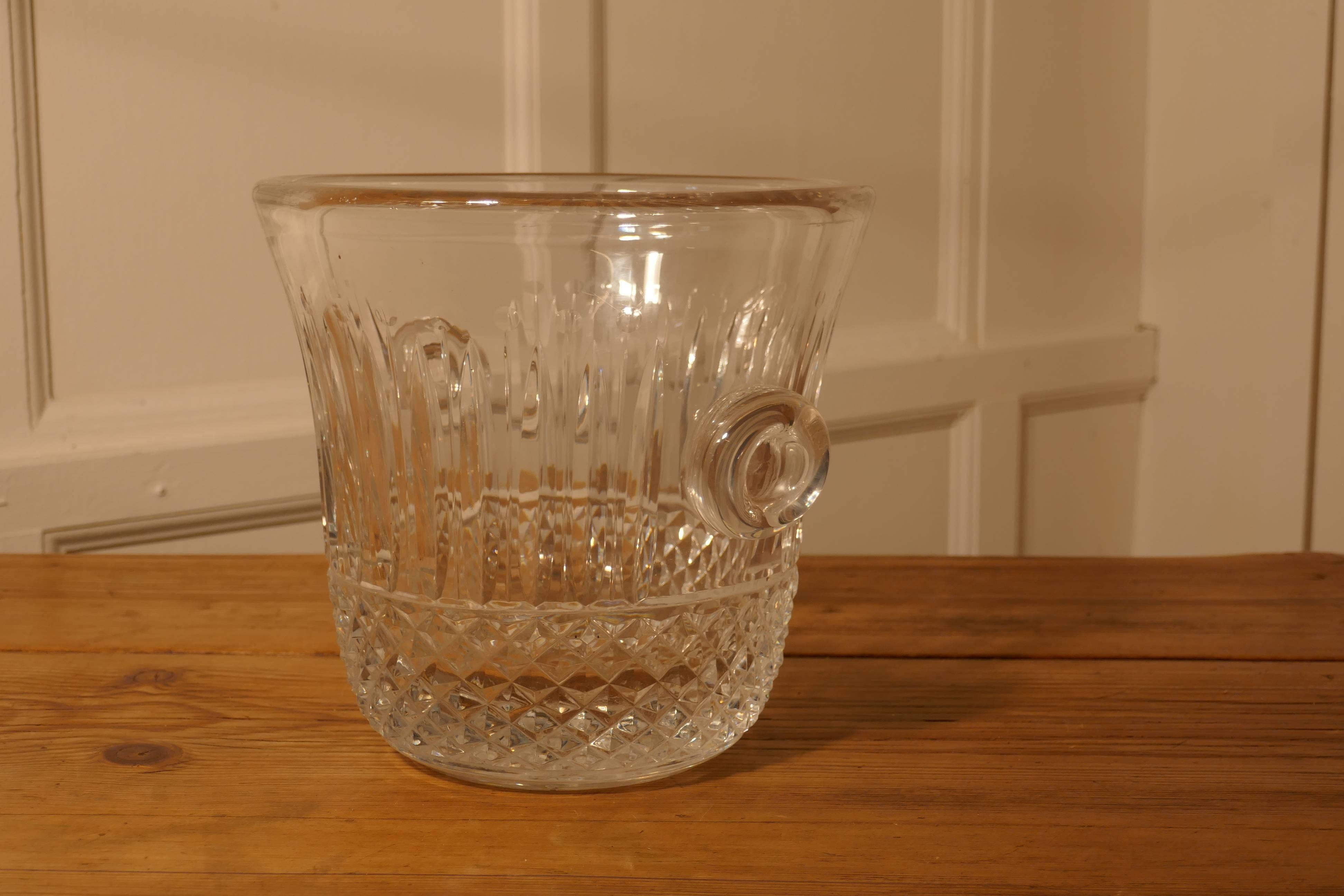 Saint-Louis crystal tommy ice bucket, hand-cut French crystal wine cooler

Tommy, is the favourite design from Saint-Louis since 1928, it has straight elegant lines
Founded in 1586, Saint-Louis crystal has a rich history as purveyors of fine