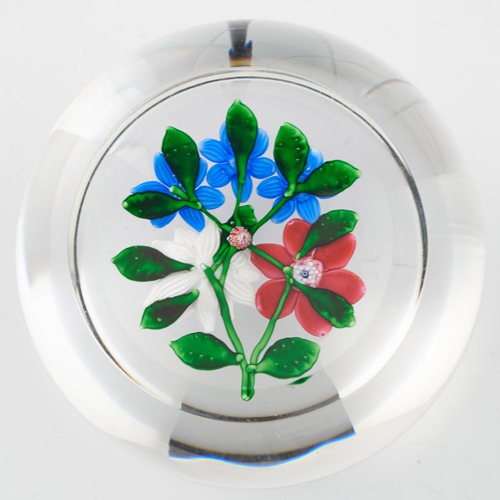 Heading : A St Louis Five Flower Lampwork & Millefiori Paperweight 1986
Date : 1986
Origin : Baccarat, France
Features : Five lampwork and millefiori flowers, stems and leaves on a clear ground
Marks : A St Louis SL1986 millefiori cane to the base