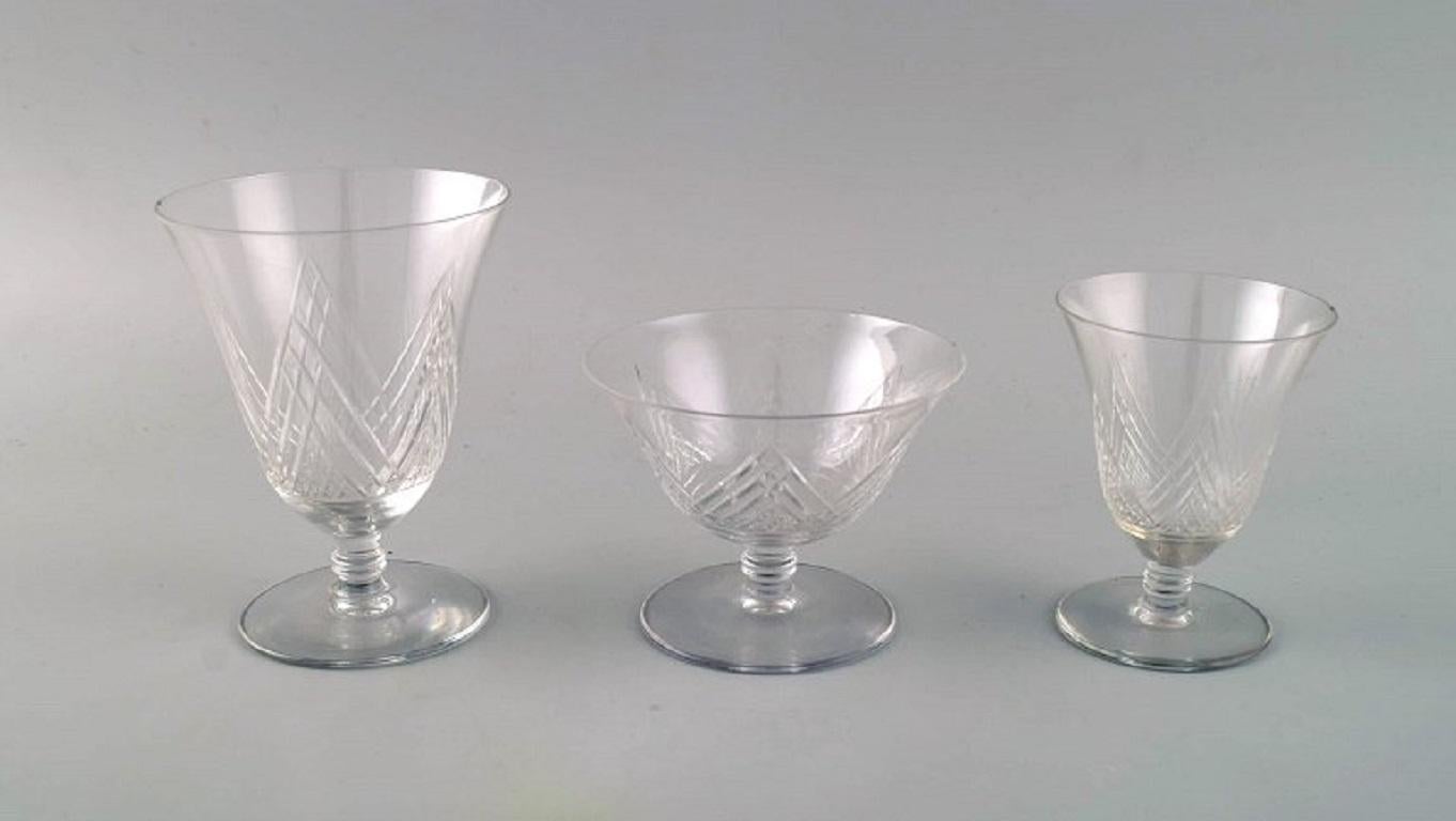 Art Deco Saint-Louis, France, Eight Sherry and Wine Glasses in Clear Crystal Glass For Sale