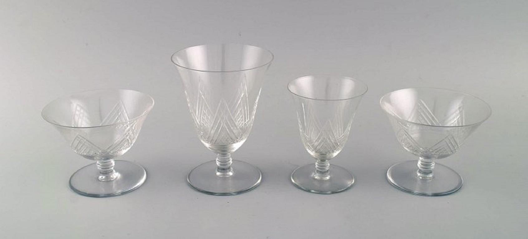 Saint-Louis, France. Four glasses in clear mouth-blown crystal glass. 1930s.
Largest glass measures: 12 x 9 cm.
Smallest glass measures: 9.5 x 7 cm.
In excellent condition.