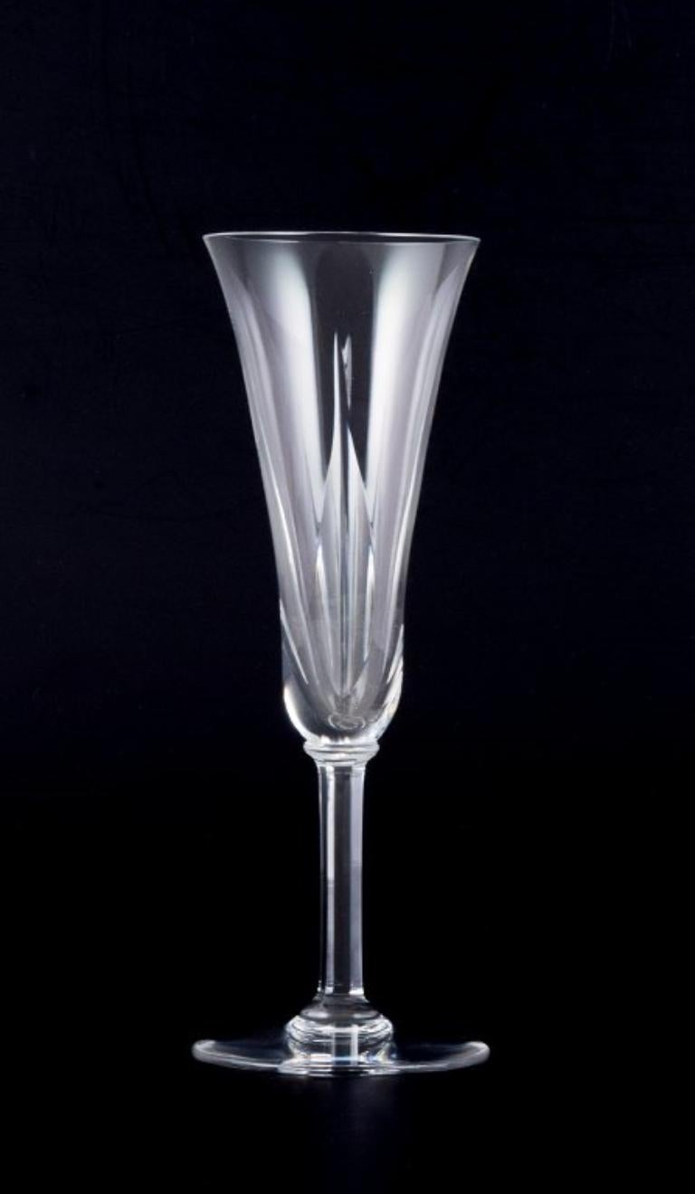 French Saint Louis, France. Set of six champagne flutes in cut crystal glass.  For Sale