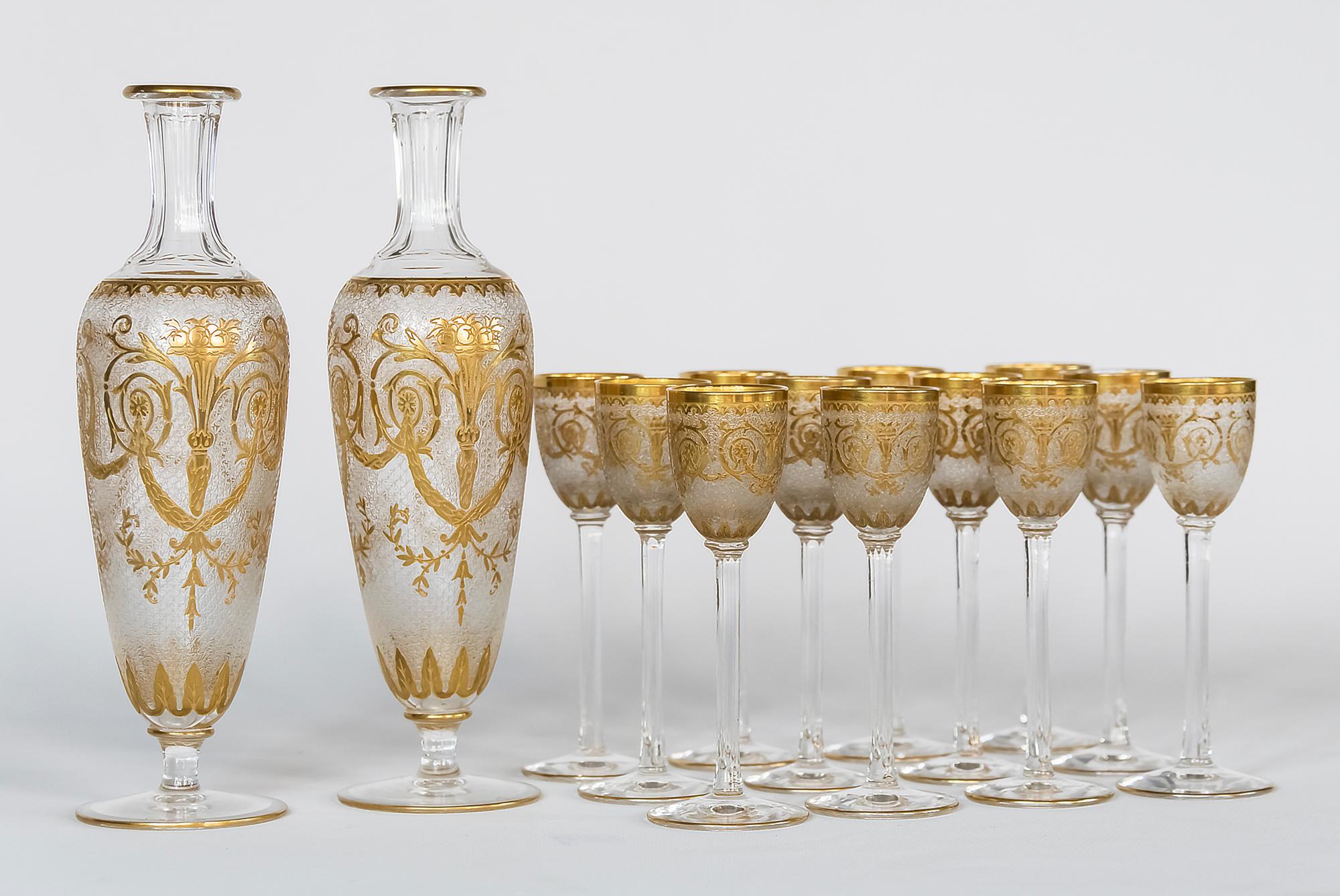 Antique French Saint Louis cut and frosted crystal liqueur set decorated with gilded ornaments.
This set includes 12 pieces of goblets, 2 pieces of decanters (without stoppers).

Very good antique condition. 

 