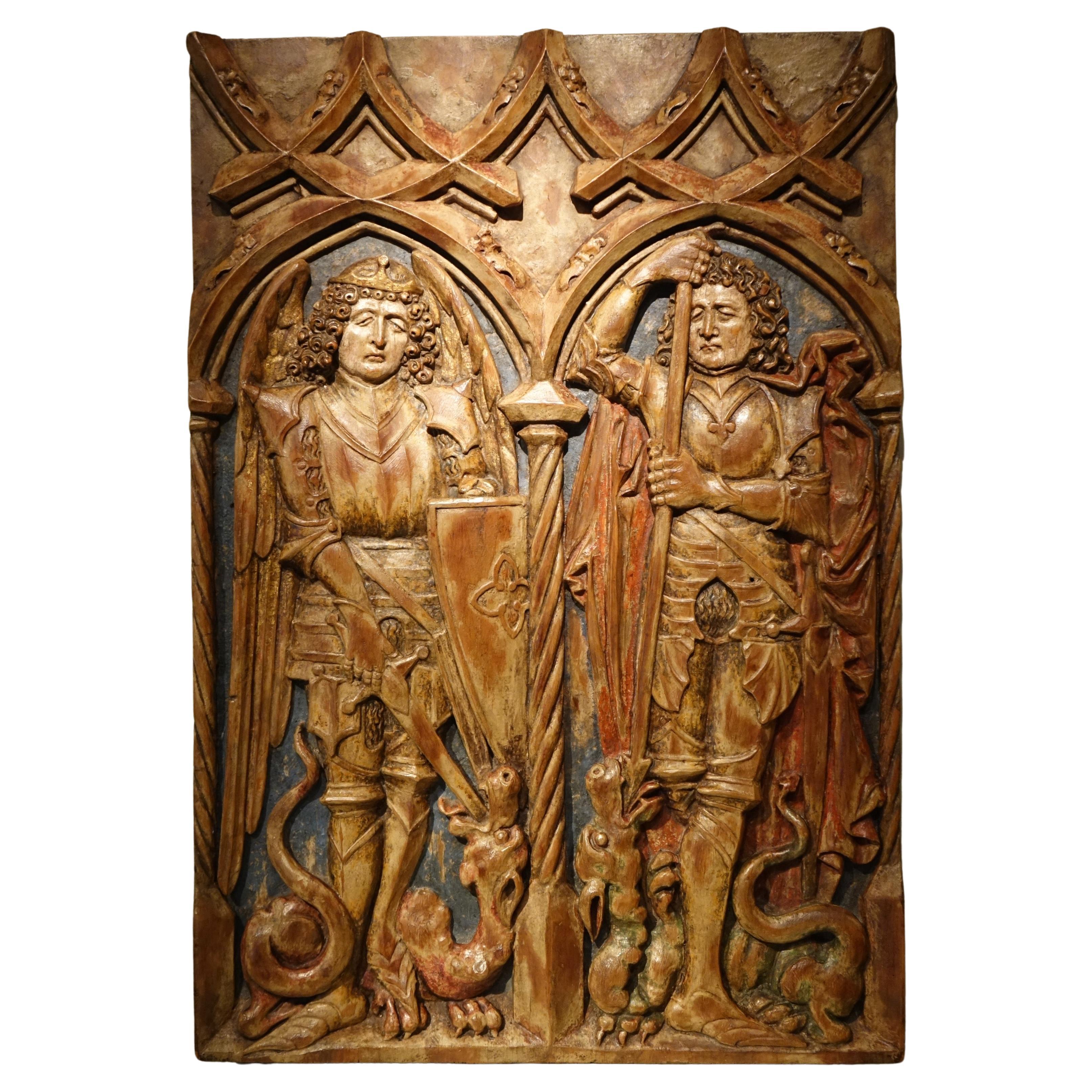 Saint Michael and Saint George, lime wood mid-relief Germany c. 1500