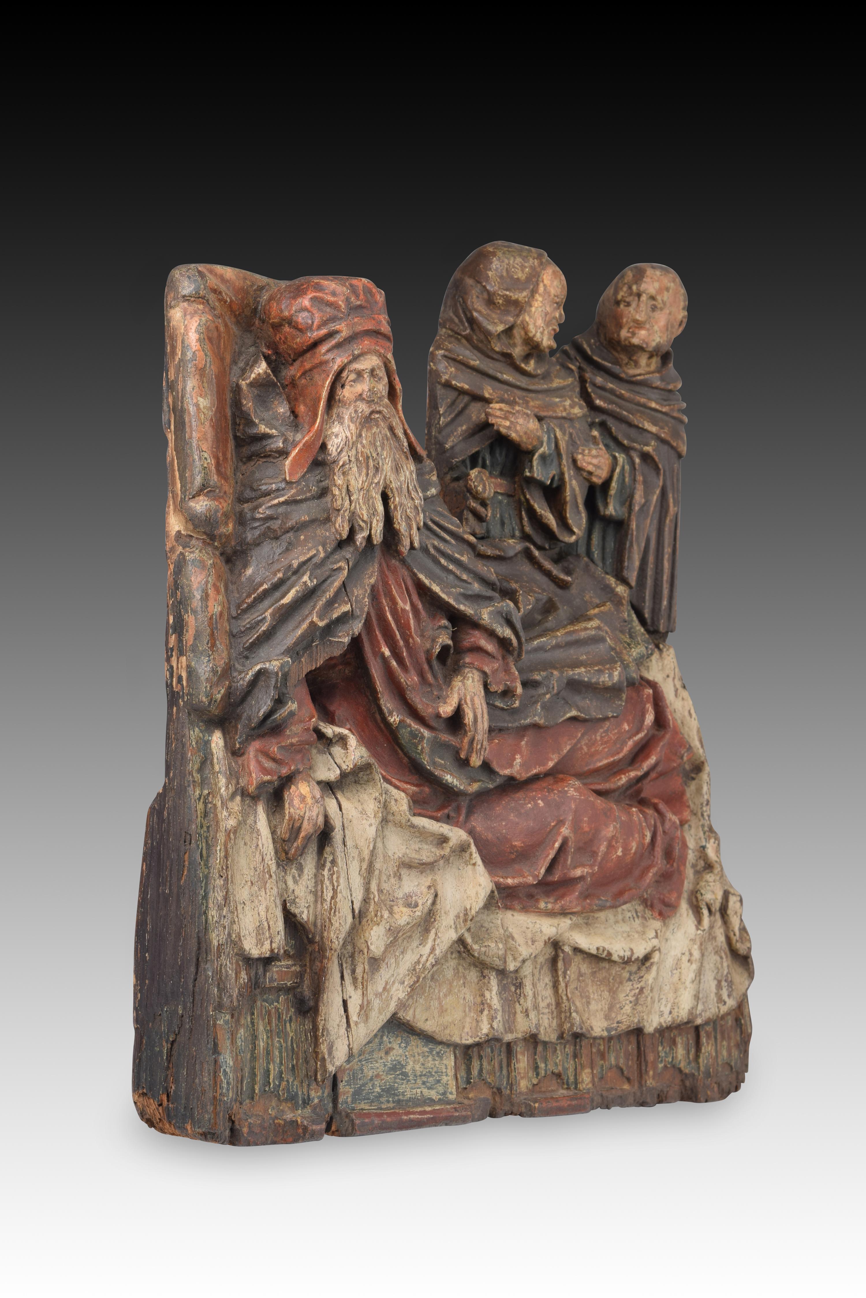 Dream of a saint. Carved and polychrome wood. Flemish school, 16th century. 
Relief made of carved and polychrome wood that shows an old man with a particular headdress (reminiscent of some chaperones) lying on a bed and accompanied by two friars