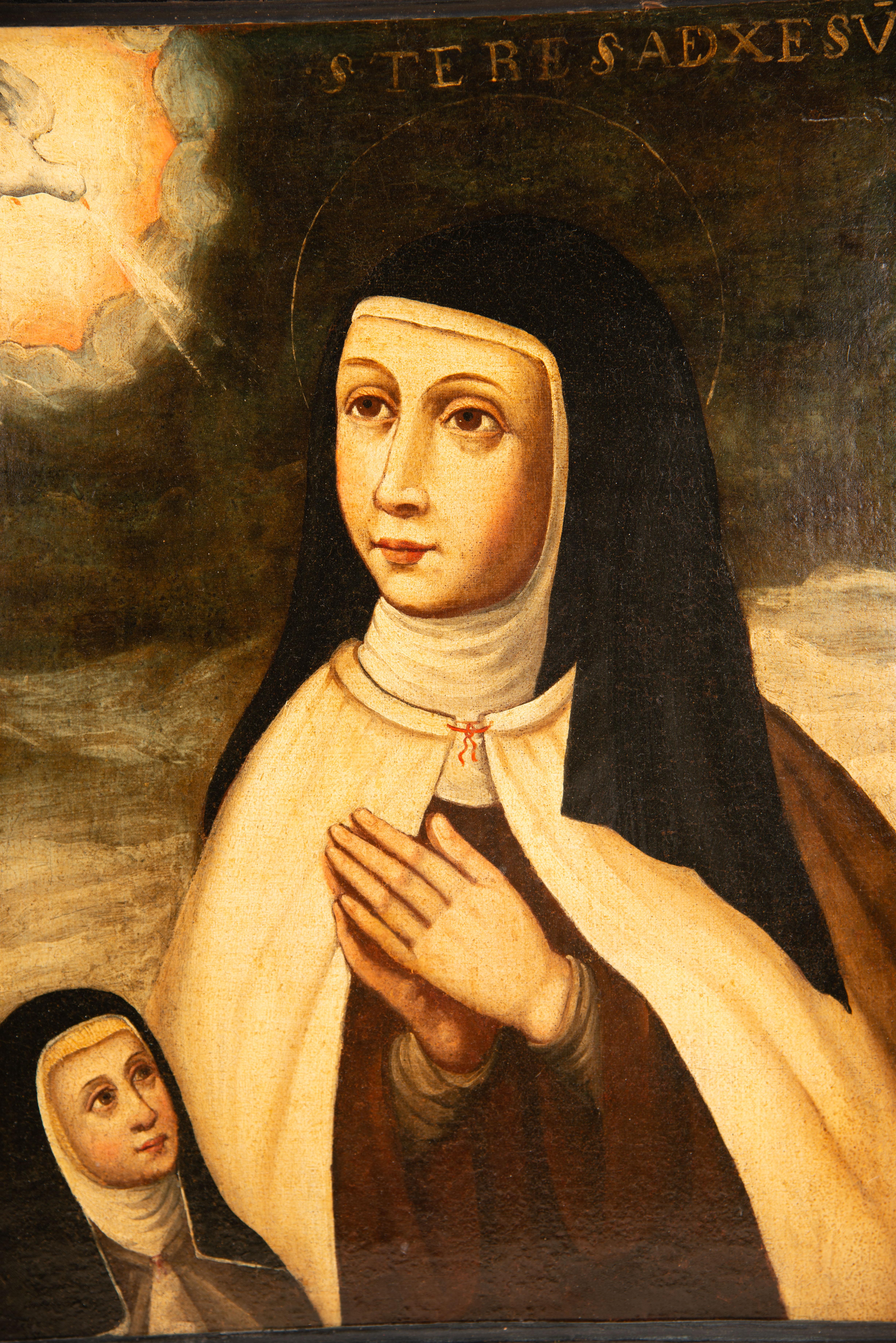 Saint Teresa of Avila. Oil on canvas. Spanish school, 17th century. 
Oil on canvas showing a woman in a Carmelite habit joining her hands in a gesture of prayer and looking up at a dove (Holy Spirit) which is also identified with a text in capital