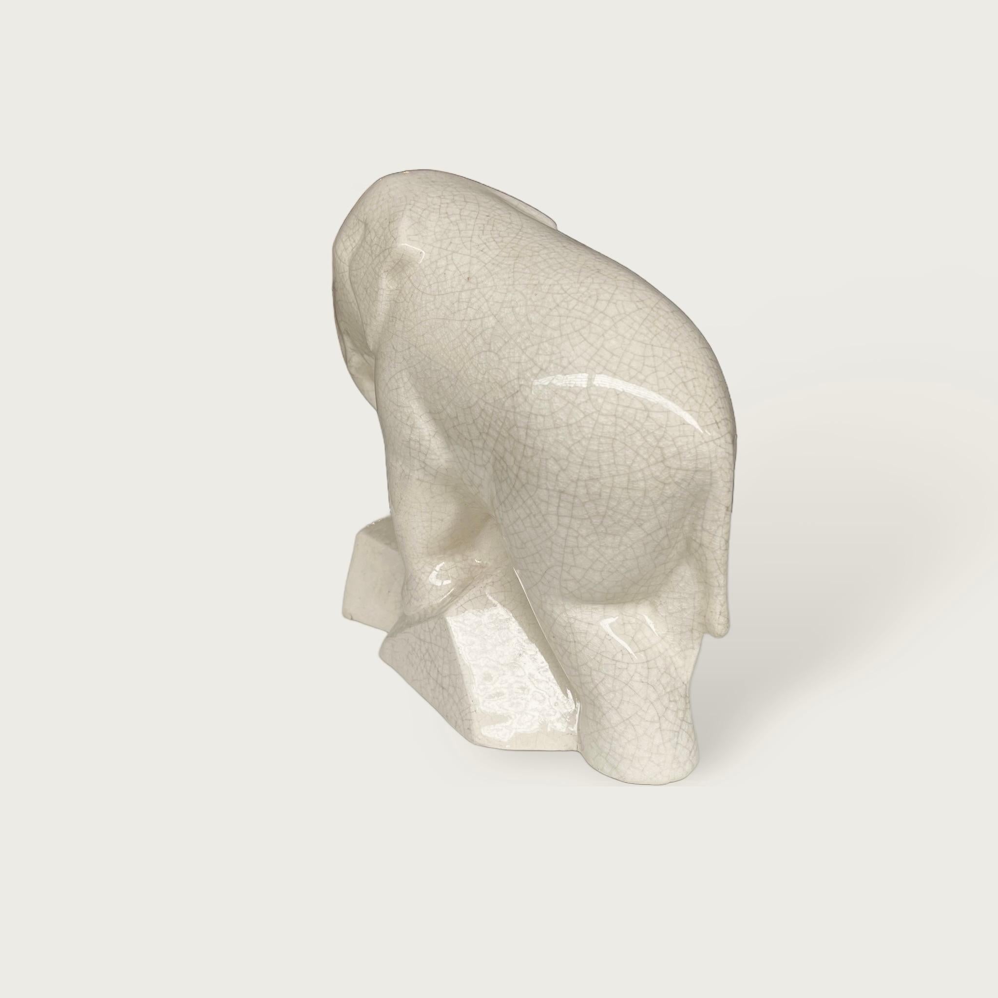 An Art Deco ceramic elephant with crackle glaze. Produced by the Sainte-Radegonde ceramic Factory who were renown for it's diverse range of ceramics and for their collaboration with Primavera.