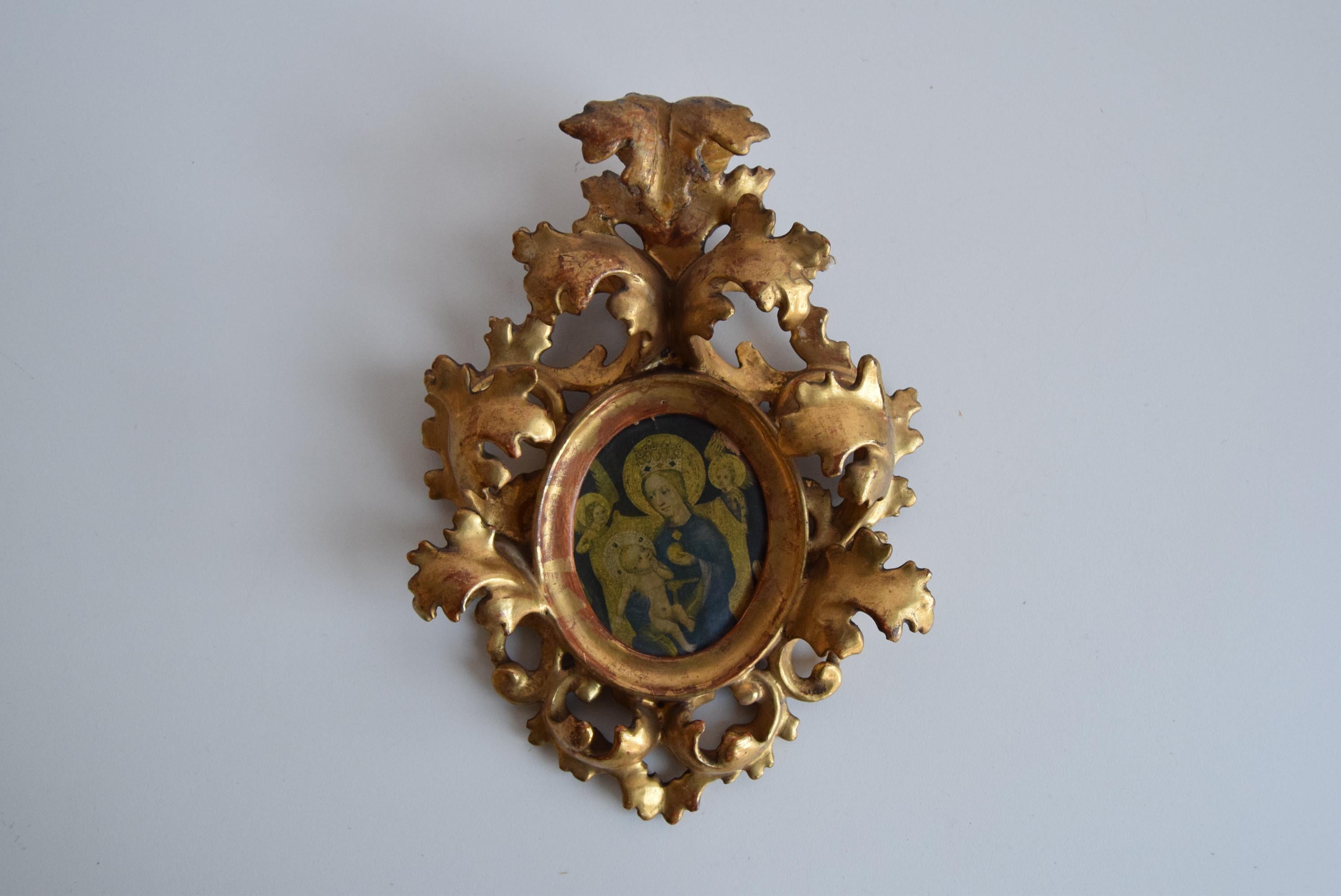 I am offering for sale an antique relief of a saint made of plaster and wood, this unique piece with a beautiful patina of time comes from the last century and is a great addition to a collection or a stylish interior. It shows signs of age and is
