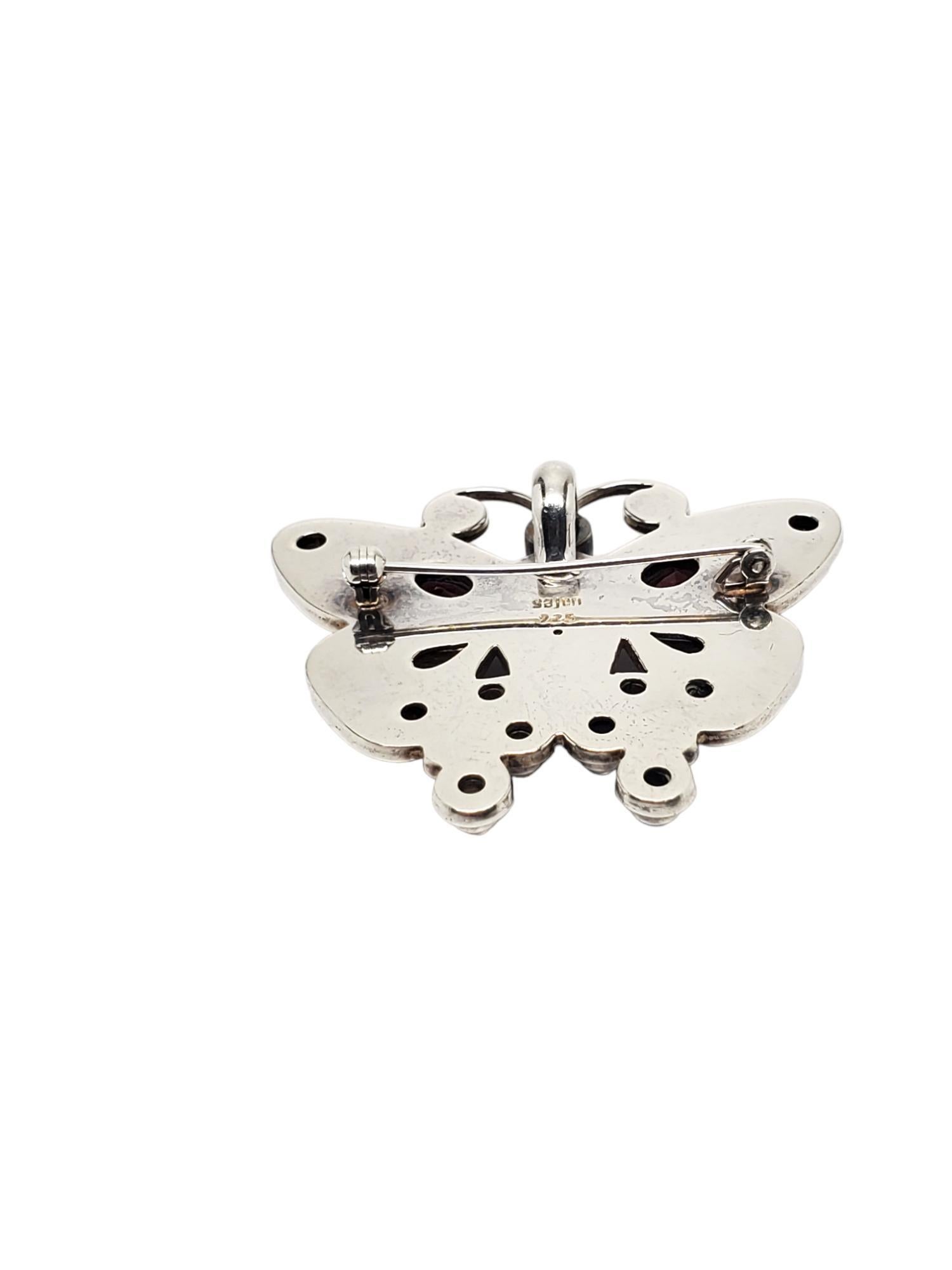 SAJEN Argent Sterling Cinnabar Pendentif/Broche-

Ce papillon vintage en argent sterling avec un centre en cinabre (18,70 mm x 7,88 mm) est entouré de ce qui semble être du grenat et de la pierre de lune (n'a pas été testé en laboratoire).

Taille :