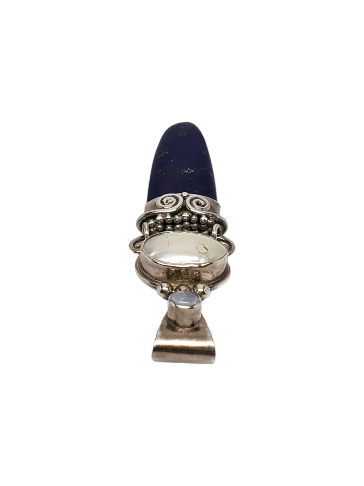 SAJEN Sterling Silver Lapis Lazuli Sword Pendant

This unique SAJEN pendant is meticulously set in sterling silver with lapis lazuli point (28.60 mm x 10.26 mm)

Size: 2.5 in. x 0.6 in.

Stamp: SAJEN 925

Weight: 4.8 dwt / 7.5 gr.

*Chain not