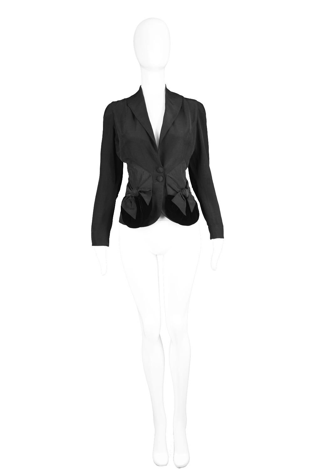 Saks 5th Avenue 1950s Vintage Black Faille & Velvet  Bow Detail Women's Blazer Jacket

Estimated Size: fits roughly like a modern UK 8/ US 4/ EU 36. Please check measurements.  
Bust - 34” / 86cm
Waist - 26” / 66cm
Length (Shoulder to Hem) - 21” /