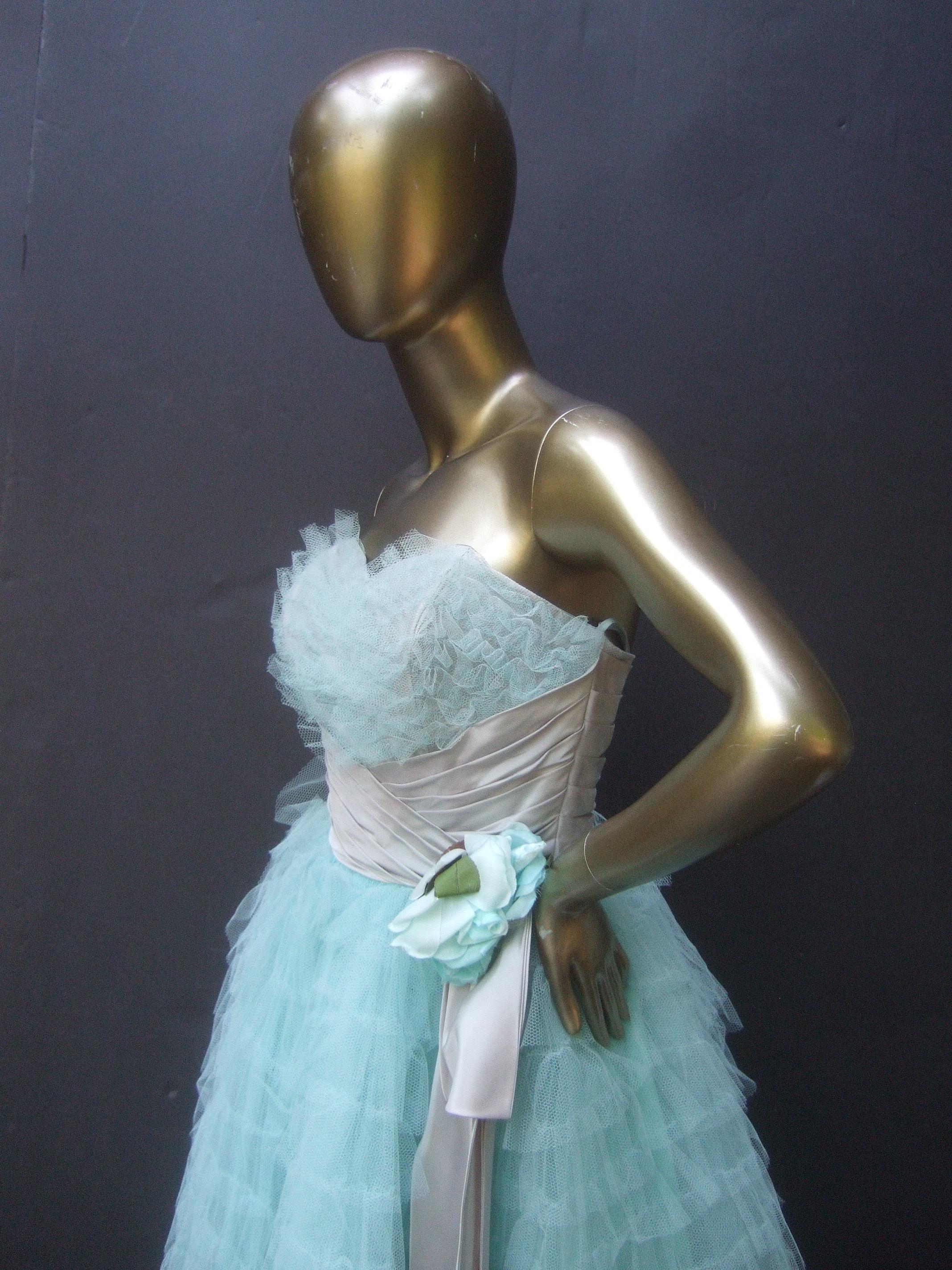 evening dress in pale blue tulle with stole