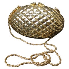 Bolso de noche «Minaudière» de SAKS FIFTH AVENUE, de metal dorado italiano, de Italia, hacia 1980