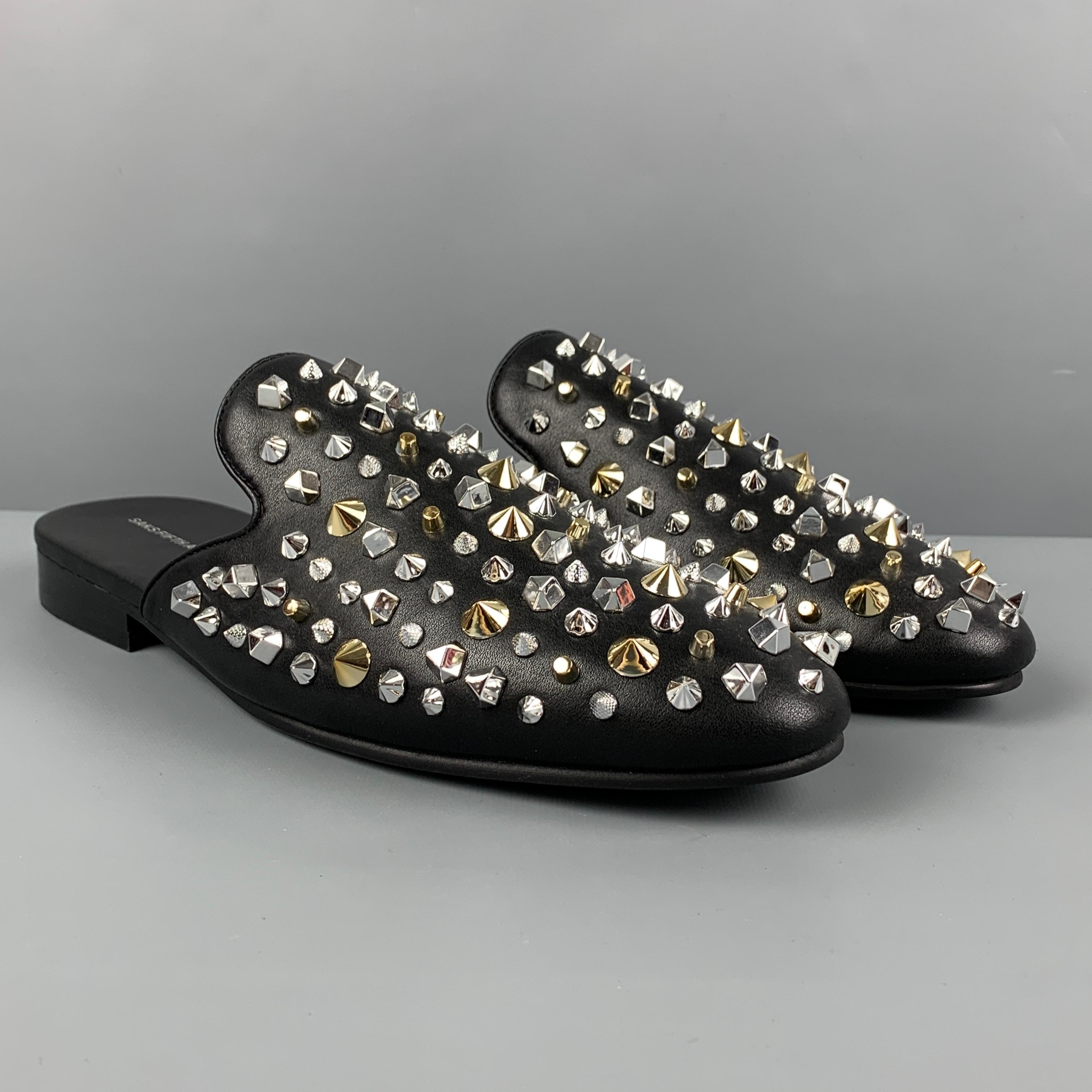 SAKS FIFTH AVENUE mules comes in a black leather featuring a rumi studded design and a slip one style. 

Excellent Pre-Owned Condition.
Marked: 12 M

Outsole: 12 in. x 3.75 in. 