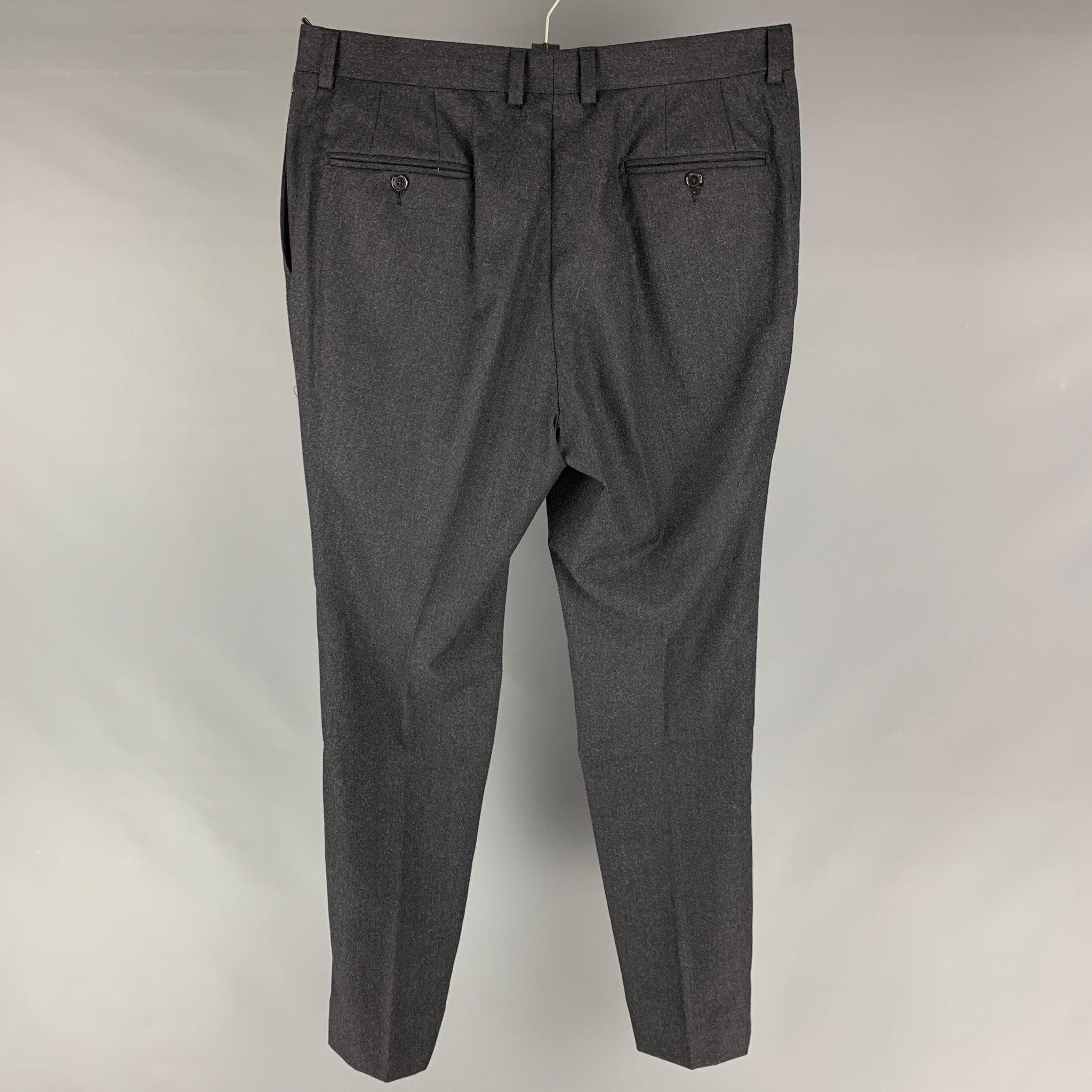 SAKS FIFTH AVENUE trousers comes in a grey wool featuring a flat front and a zip up closure. Very Good Pre-Owned Condition 

Marked:  36 

Measurements: 
 Waist: 36 inches Rise: 8 inches Inseam: 32 inches 
 



 
 
 
Reference: 125928
Category: