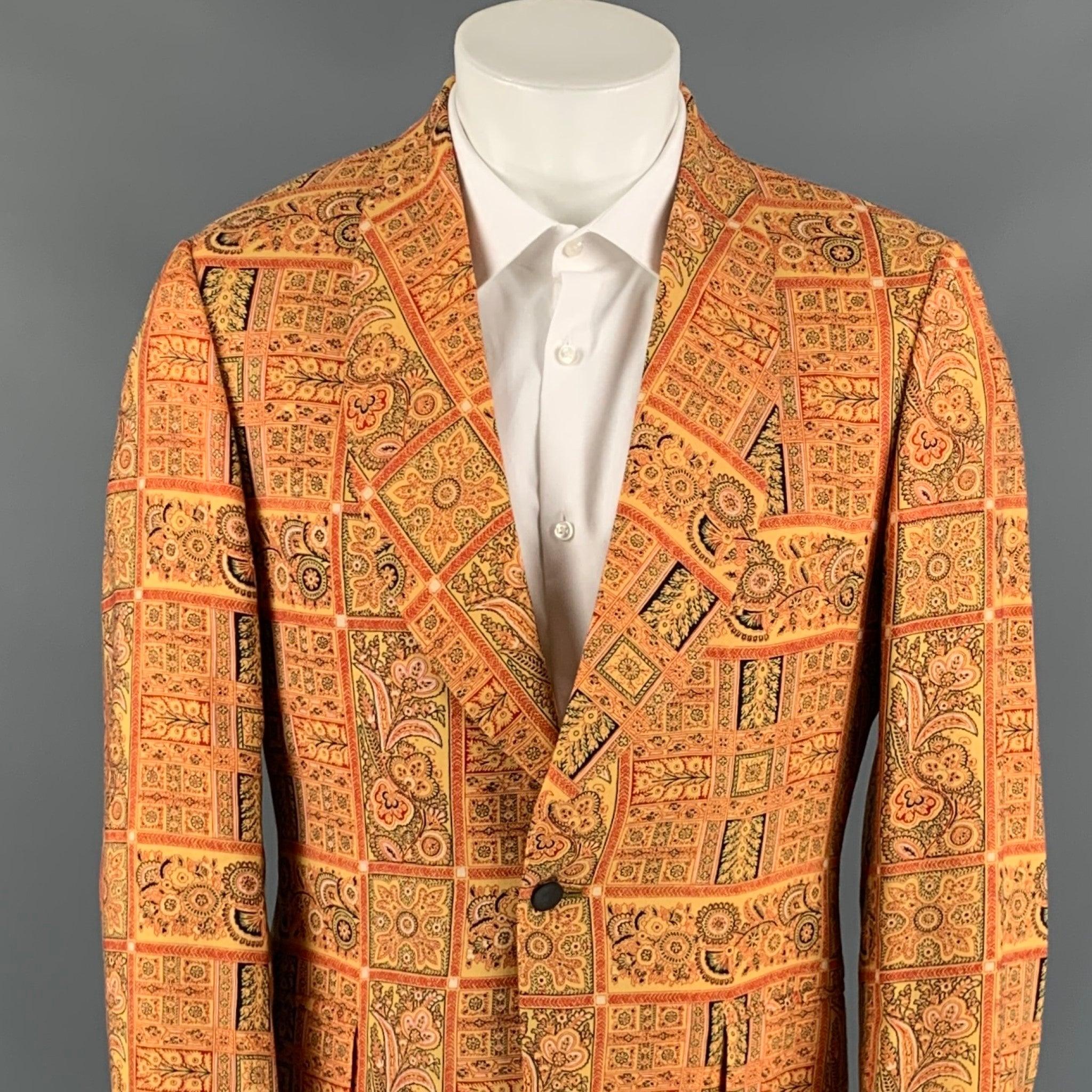 SAKS FIFTH AVENUE sport coat comes in a gold & red print wool blend with a full liner featuring a shawl collar, single back vent, flap pockets, and a single button closure. Made in USA. Very Good
Pre-Owned Condition.  

Marked:   No size marked. 