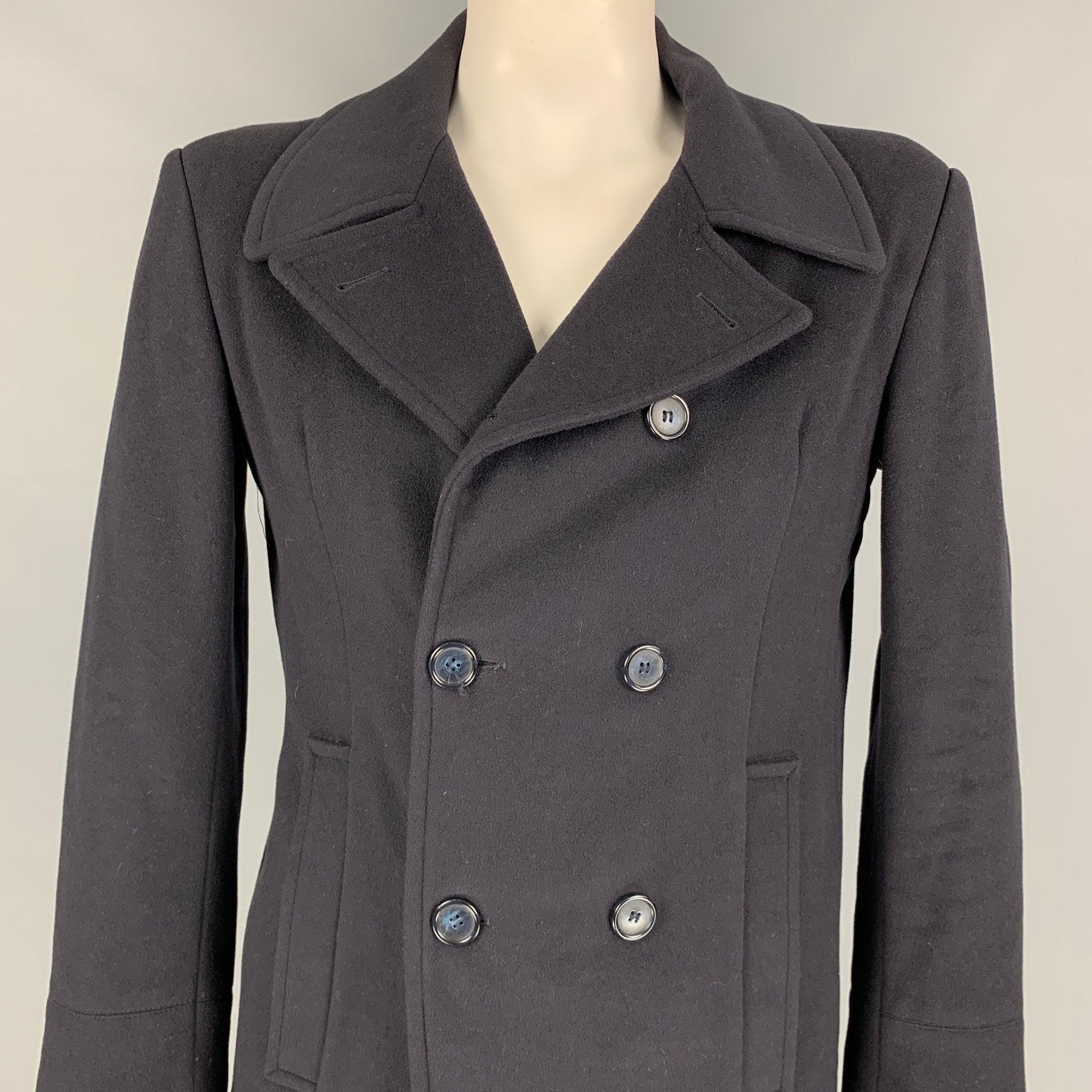SAKS FIFTH AVENUE peacoat comes in a navy cashmere featuring a quilted liner, single back vent, and a double breasted closure.
Good
Pre-Owned Condition.  

Marked:   42 R 

Measurements: 
 
Shoulder: 19.5 inches  Chest: 42 inches  Sleeve: 26 inches 