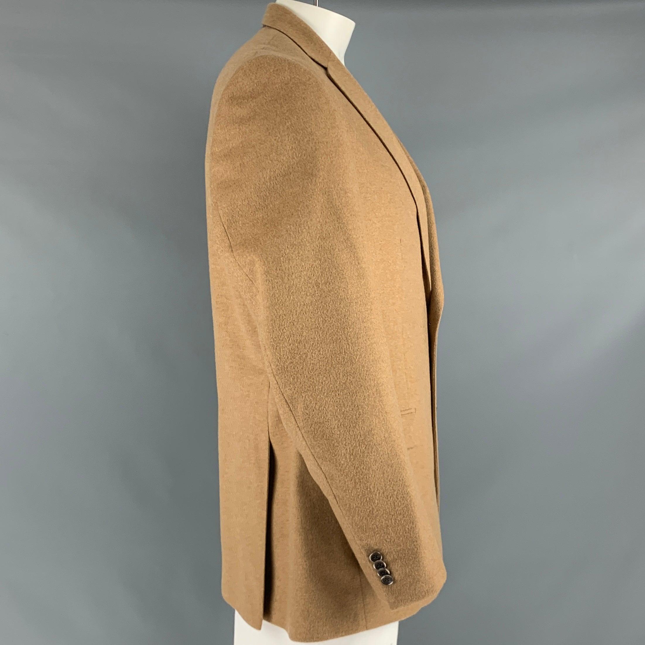 SAKS FIFTH AVENUE sport coat
in a tan cashmere fabric featuring LORO PIANA cashmere, notch lapel, and double button closure. Made in Canada.Excellent Pre-Owned Condition. 

Marked:   44L 

Measurements: 
 
Shoulder: 18.5 inches Chest: 44 inches