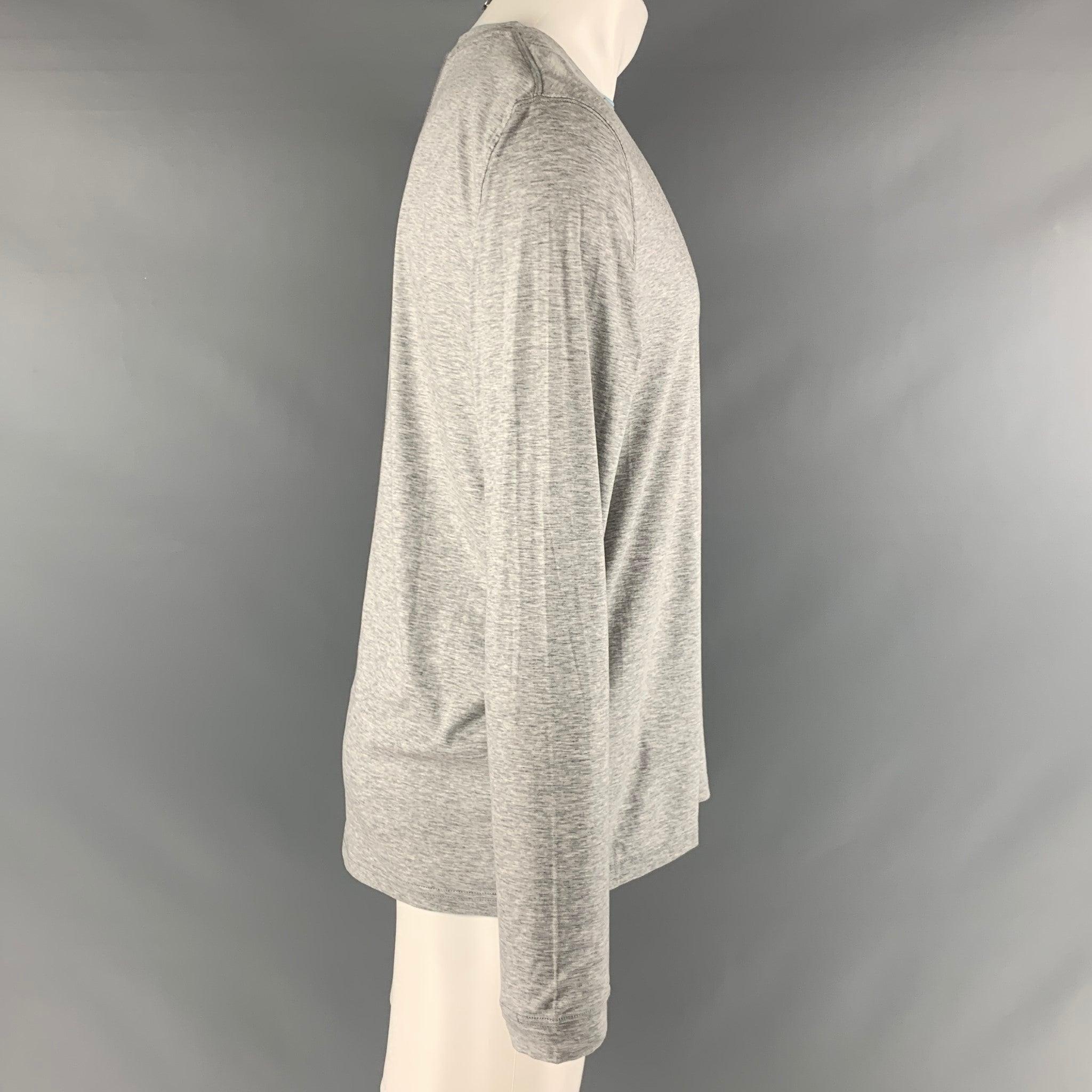 SAKS FIFTH AVENUE long sleeve t-shirt comes in a grey heather cotton and lyocell knit material featuring a blue layered crew-neck. Excellent Pre-Owned Condition. 

Marked:   M 

Measurements: 
 
Shoulder: 18 inches Chest: 38 inches Sleeve: 26 inches