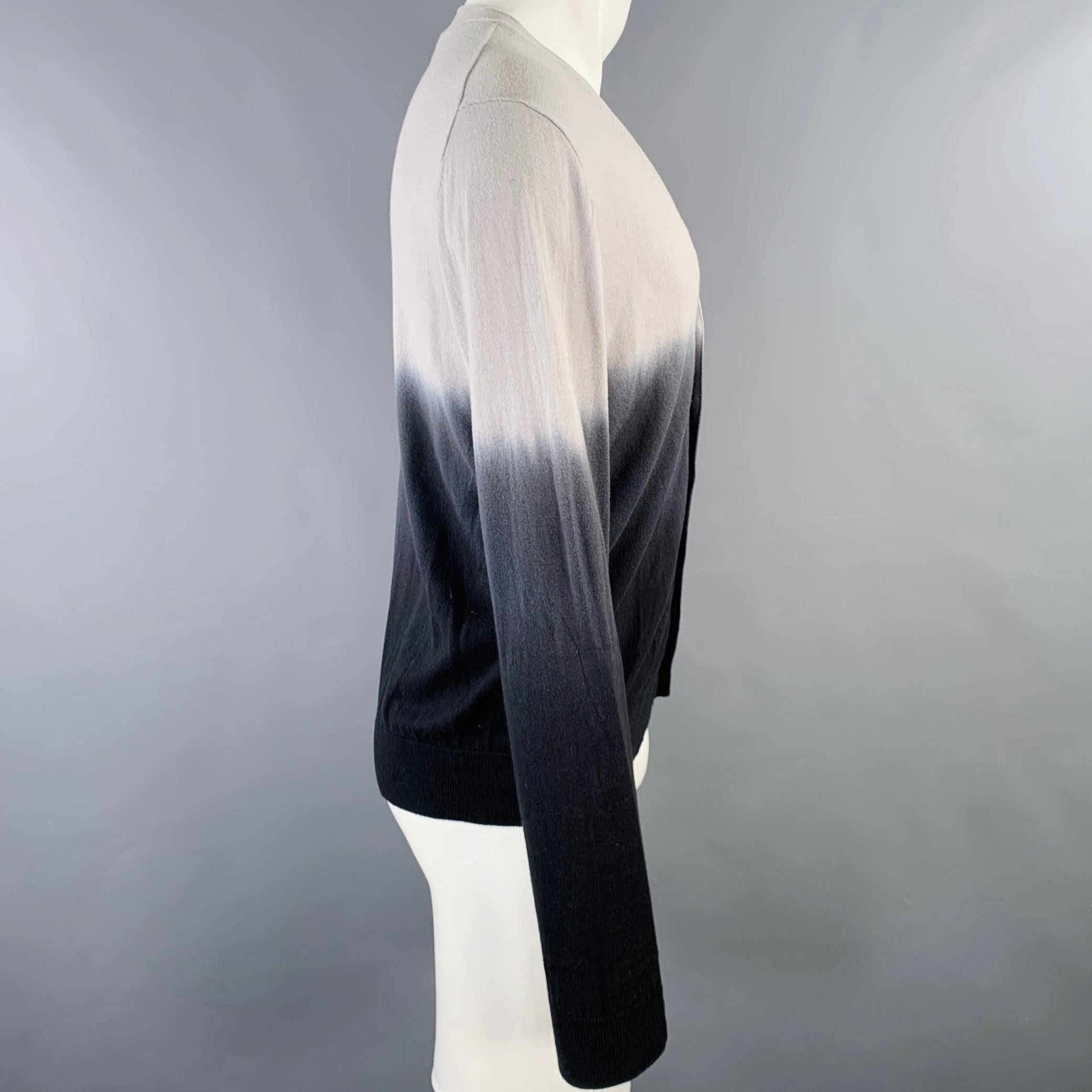 SAKS FIFTH AVENUE cardigan
in a grey and charcoal grey cotton knit featuring an ombre design, V-neck, and button closure. Very Good Pre-Owned Condition. Moderate pilling and signs of wear. 

Marked:   M 

Measurements: 
 
Shoulder: 18.5 inches