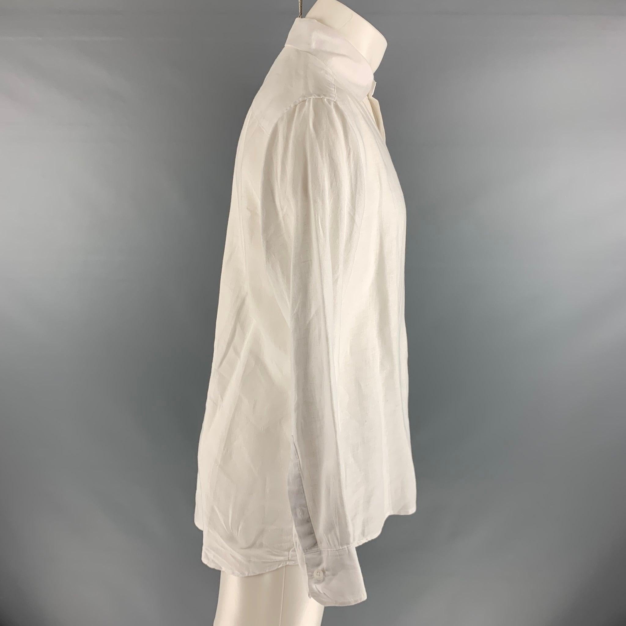 SAKS FIFTH AVENUE
long sleeve shirt comes in a 100% white linen, featuring a spread collar,button down closure, and a single pocket.Very Good Pre-Owned Condition. 

Marked:   S 

Measurements: 
 
Shoulder: 17 inches Chest: 42 inches Sleeve: 24