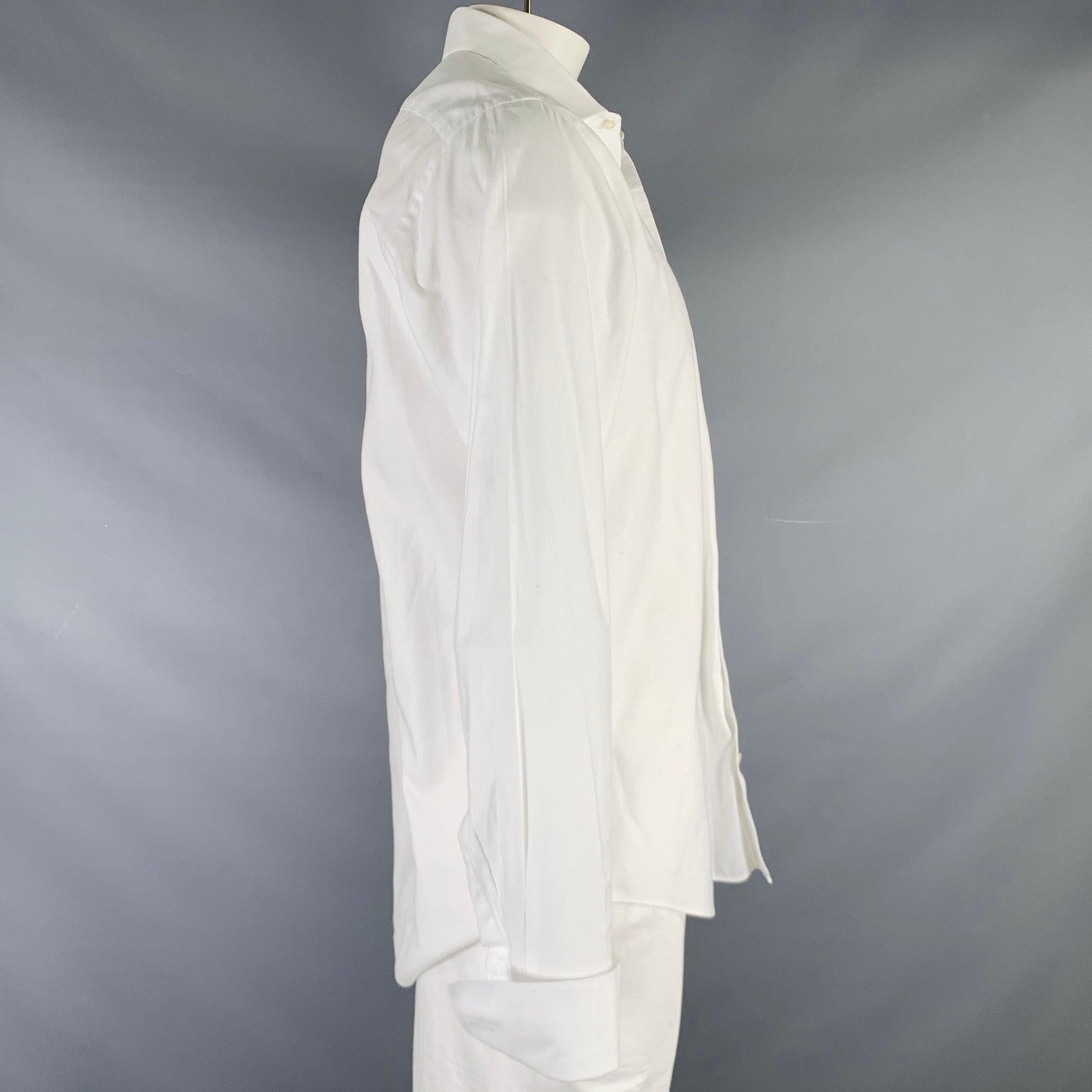 SAKS FIFTH AVENUE
long sleeve shirt in a white cotton woven fabric featuring a slim fit, spread collar, French cuffs, and button closure.Excellent Pre-Owned Condition. 

Marked:   16.5 

Measurements: 
 
Shoulder: 18 inches Chest: 47 inches Sleeve:
