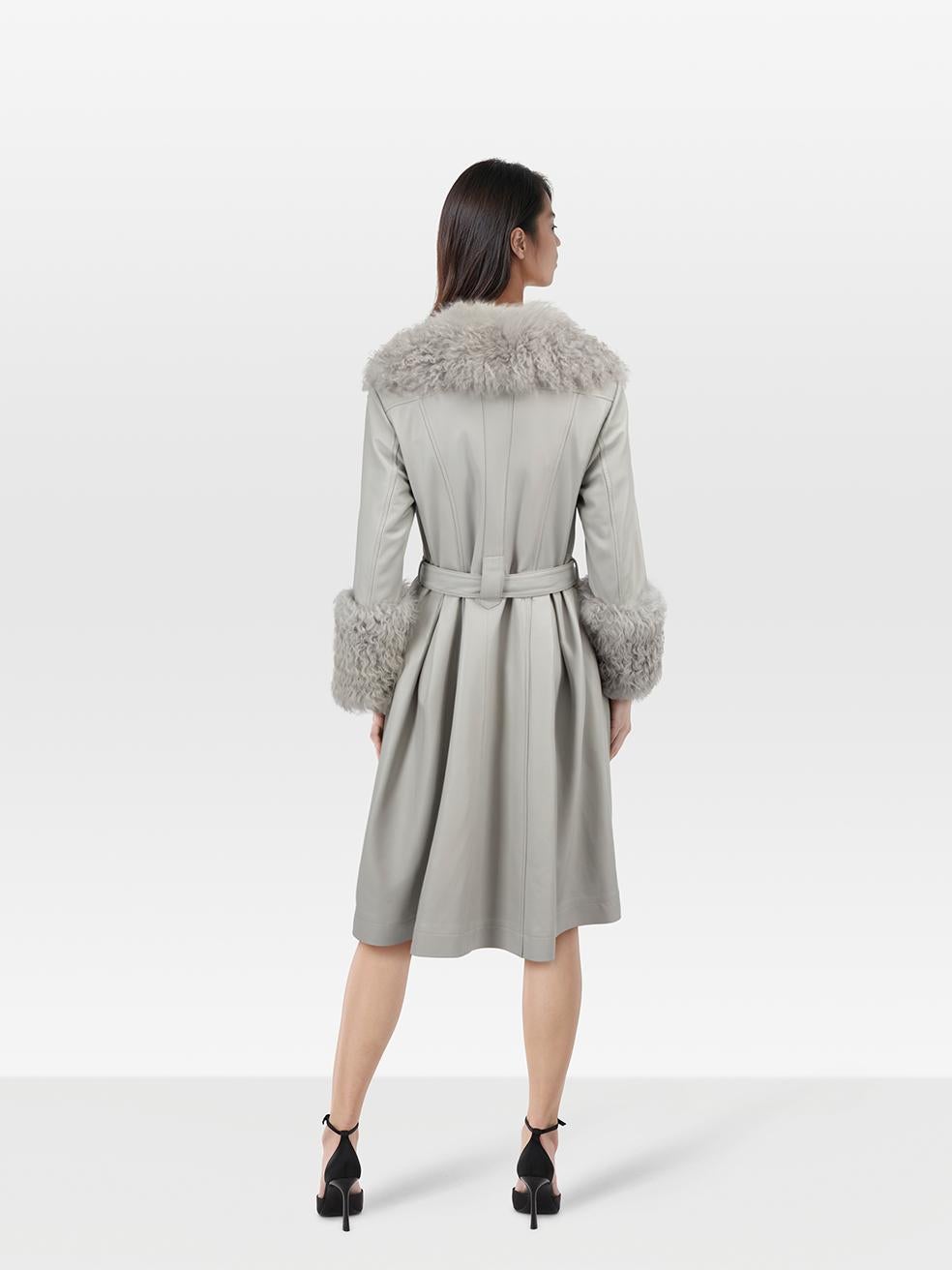 CONDITION is Very Good. Hardly any visible wear to coat is evident on this used Saks Potts designer resale item.
 
 
 
 Details
 
 
 Model: Leather Foxy Shearling
 
 Grey
 
 Leather
 
 Long coat
 
 Button up fastening
 
 Single breasted
 
 Belted
 
