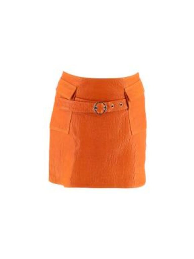 Sak Potts New York Orange Crocodile Embossed Leather Skirt
 

 - SS '22
 - Mid weight lambskin leather body
 - Embossed crocodile all over pattern 
 - Patch pockets 
 - Belt detail 
 - Mini length
 - Back concealed zip fastening 
 - Fully lined with