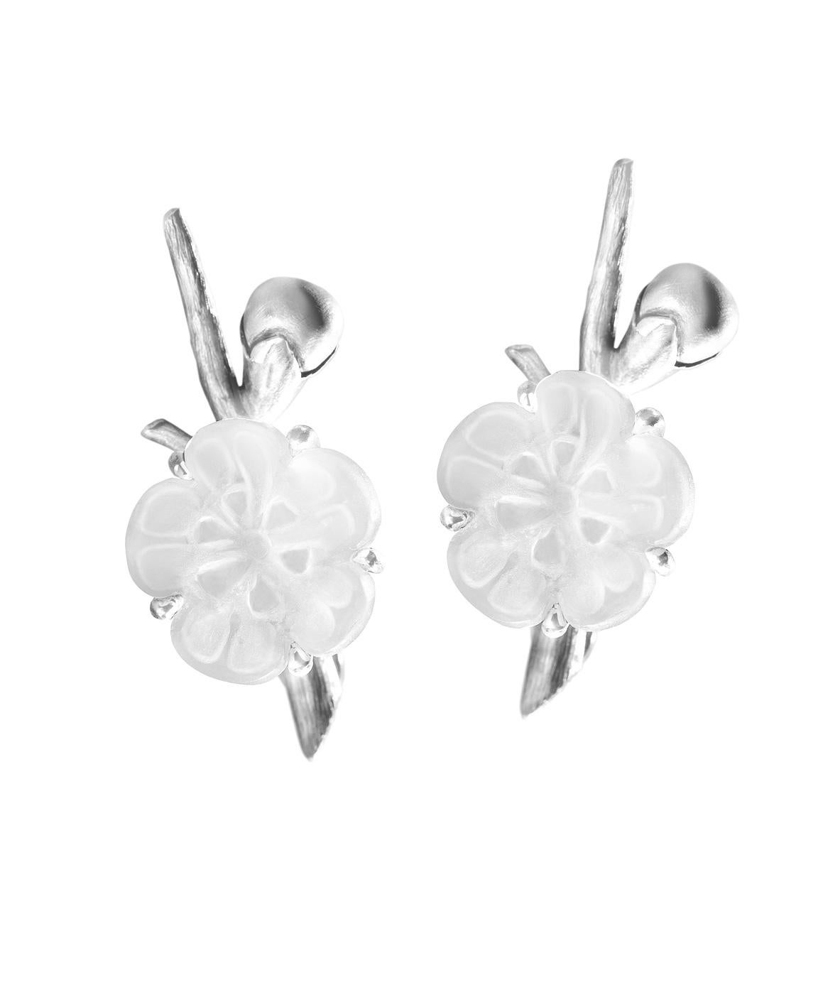 These contemporary earrings in sterling silver belong to the Sakura collection, featuring frosted cherry blossom flowers made of natural crystal. The collection has been showcased in Vogue UA magazine.

These earrings have a contemporary design and