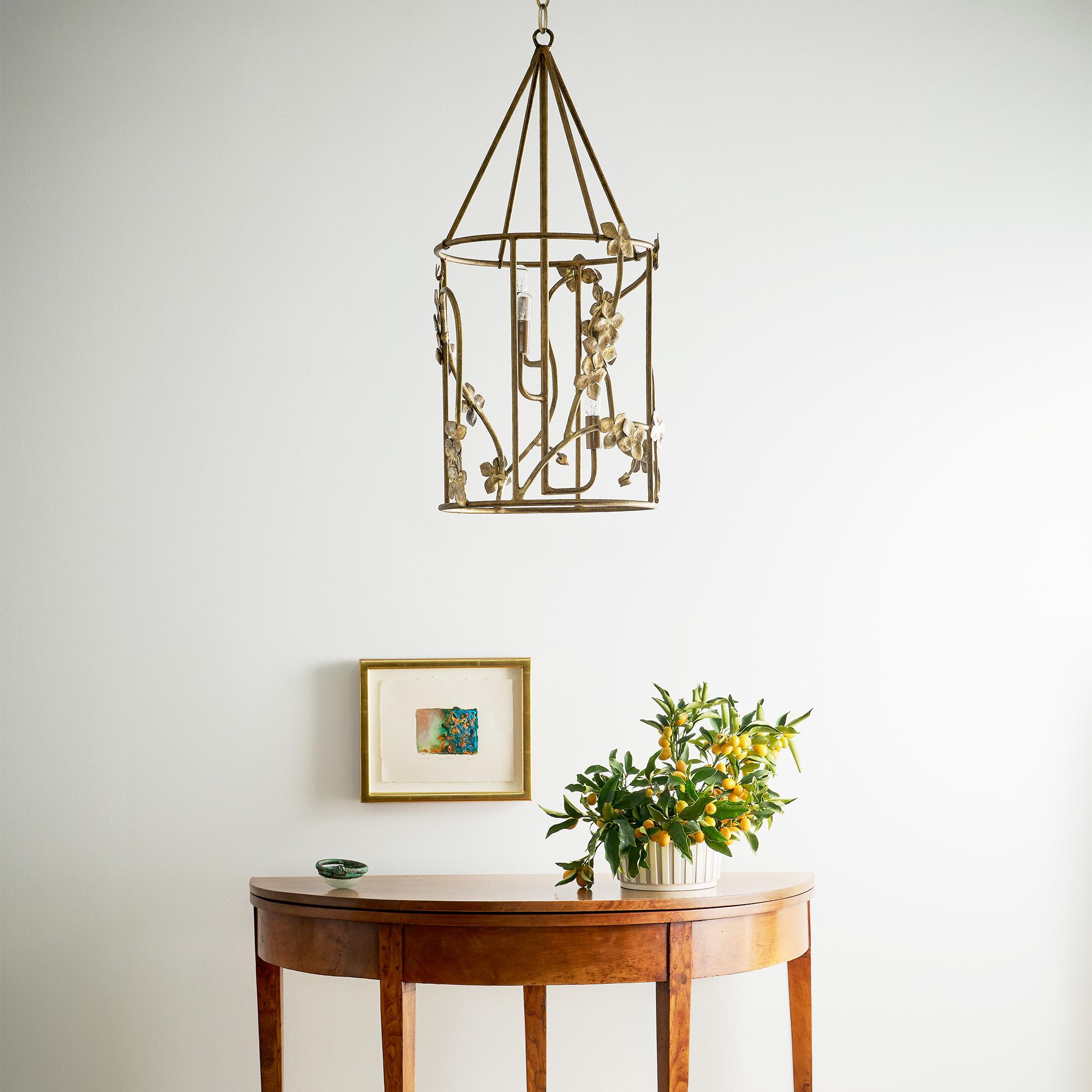 With its bronze flowers and delicate branches, the Sakura Floral Lantern adds classic charm to entryways and gathering spaces.

The Sakura Floral Lantern is not just a lighting fixture; it’s a statement piece that brings elegance and warmth to any