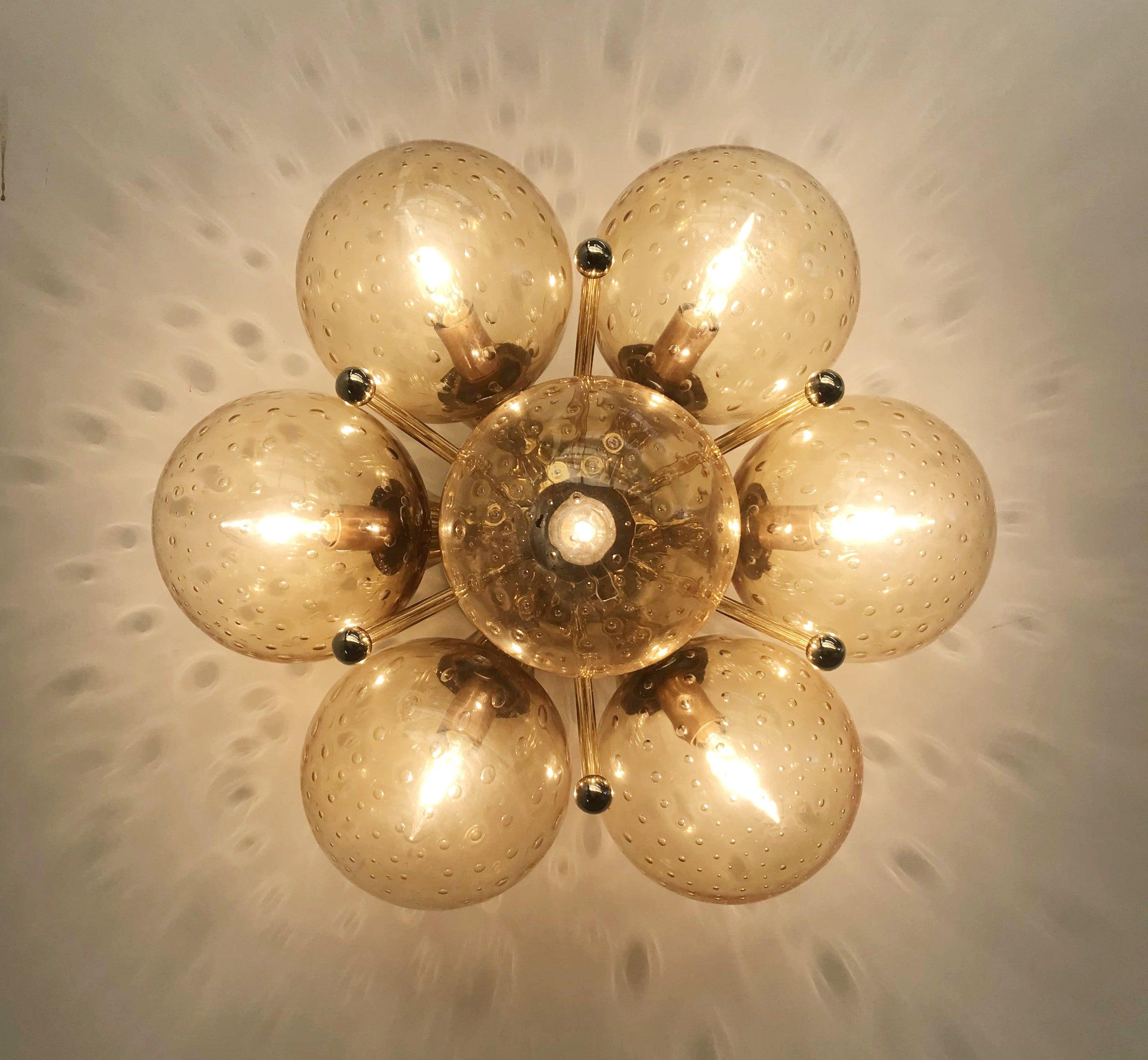 Italian flush mount with Murano glass globes mounted on solid brass frame
Designed by Fabio Bergomi / Made in Italy
7 lights / E12 or E14 type / max 40W each
Diameter: 22 inches / Height: 11 inches
Order only / This item ships from Italy
Order