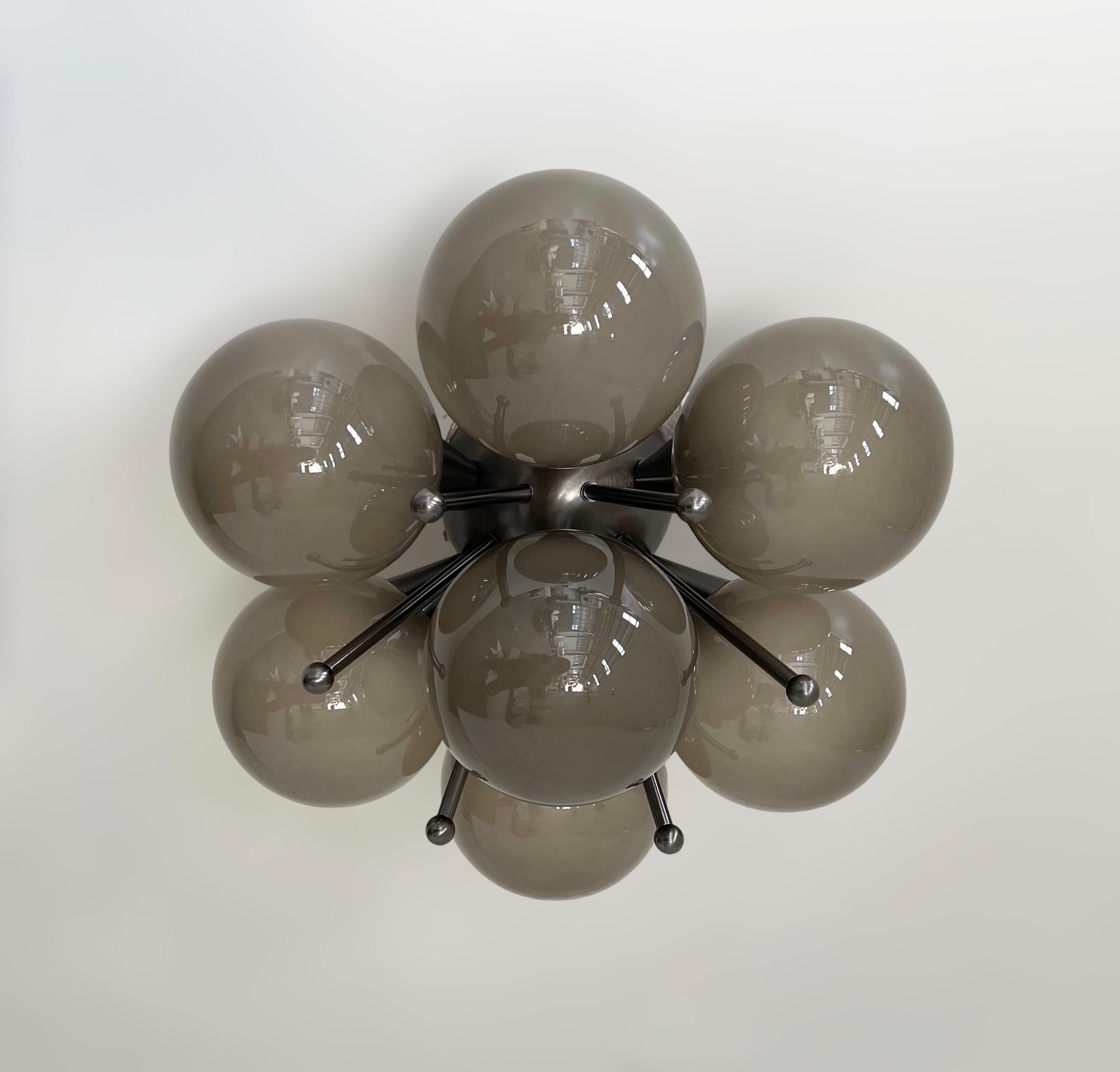 Italian flush mount with Murano glass globes mounted on solid brass frame
Designed by Fabio Bergomi / Made in Italy
7 lights / E12 or E14 type / max 40W each
Diameter: 22 inches / Height: 11 inches
Order only / This item ships from Italy
Order