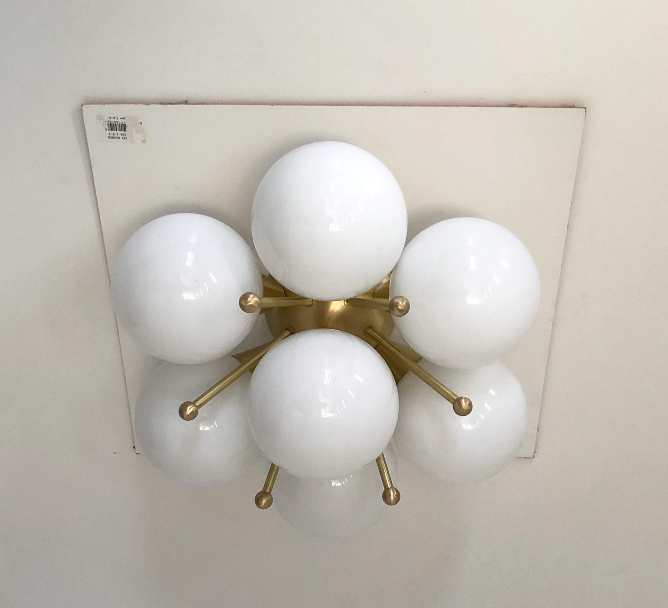 Italian flush mount with Murano glass globes mounted on solid brass frame
Designed by Fabio Bergomi / Made in Italy
7 lights / E12 or E14 type / max 40W each
Diameter: 22 inches / Height: 11 inches
Order only / This item ships from Italy

The