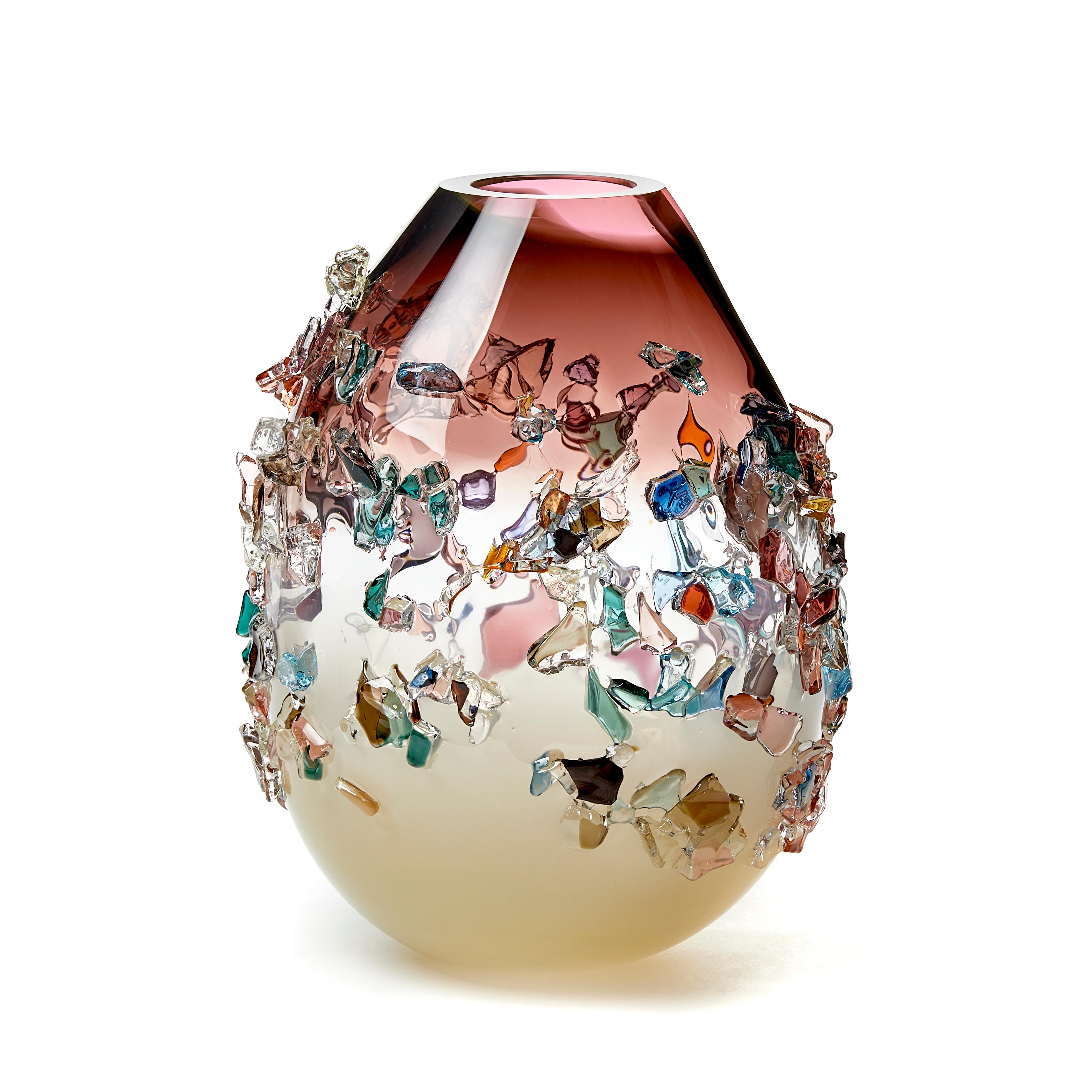Sakura TRP20003 is a unique dark pink, ivory and multicolored hand blown art glass sculptural vase, covered in an organic glass shard adornment by the Dutch artist Maarten Vorlijk. The piece is flame polished to soften the edges of all the