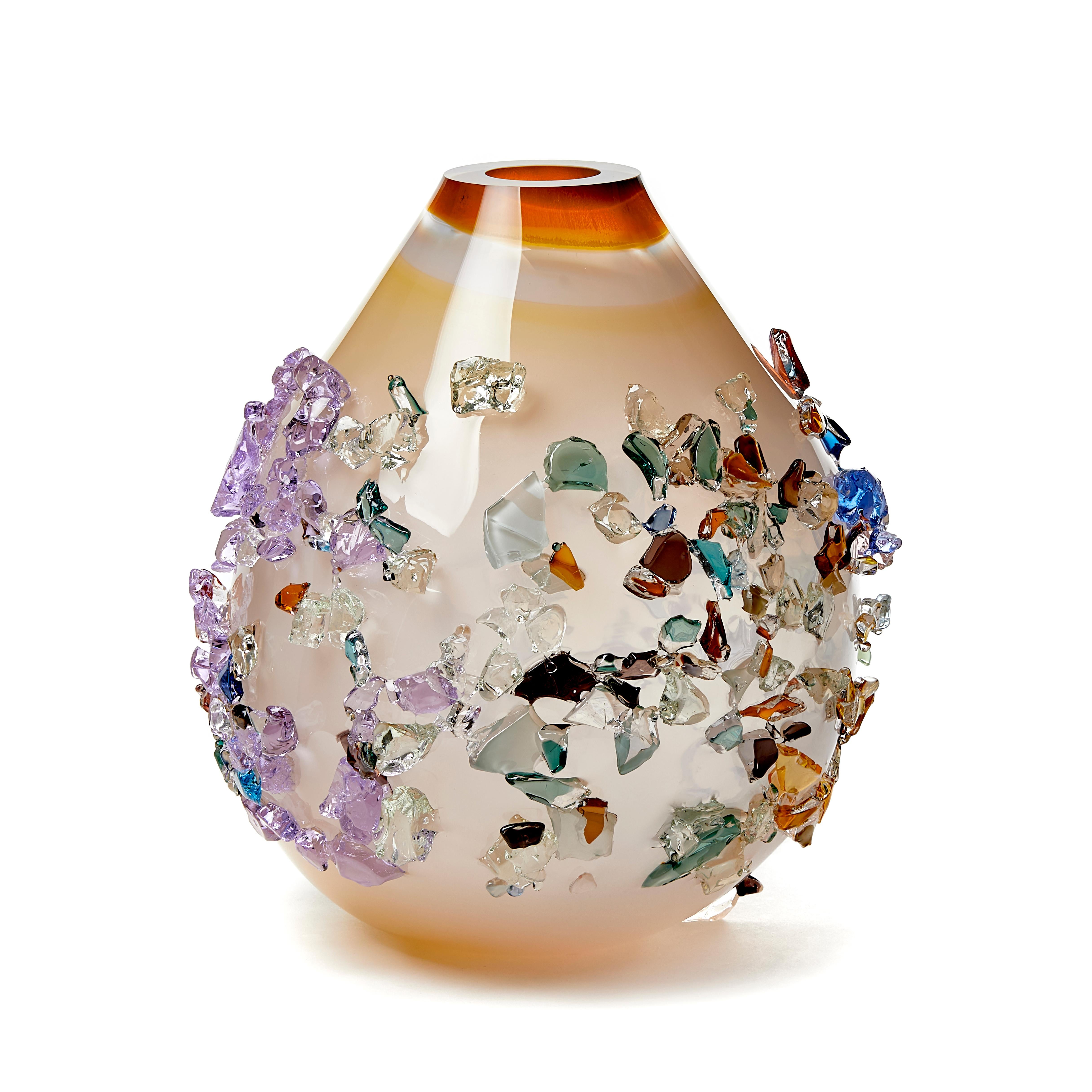 Sakura TRP20010 is a unique warm white, amber, turquoise and multicolored hand blown art glass sculptural vase, covered in an organic glass shard adornment by the Dutch artist Maarten Vorlijk. The piece is flame polished to soften the edges of all