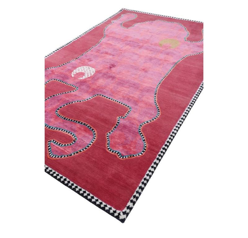 Immerse yourself in a legacy of power and wisdom with the Sakya rug, a masterpiece from the Majnun Collection. Curated by renowned AD100 designer Pavitra Rajaram, this stunning piece draws inspiration from ancient Buddhist and Hindu symbolism,