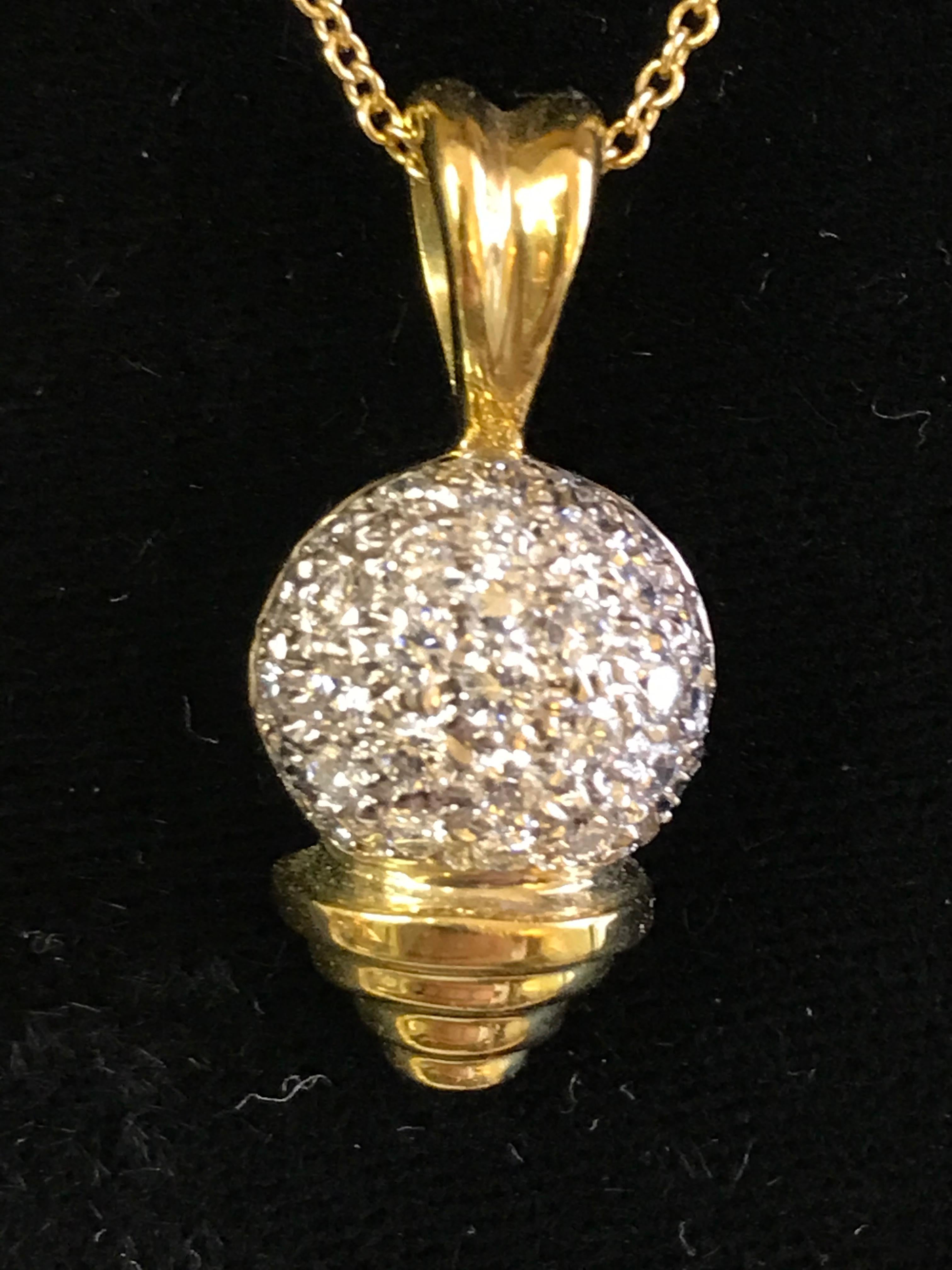 This is a perfect gift for any golfer in your life! You will for sure get noticed on and off the course.
Sal Praschnick Designer
18 karat yellow gold bale and golf tee
.74 total carat weight pave set diamonds in a round 