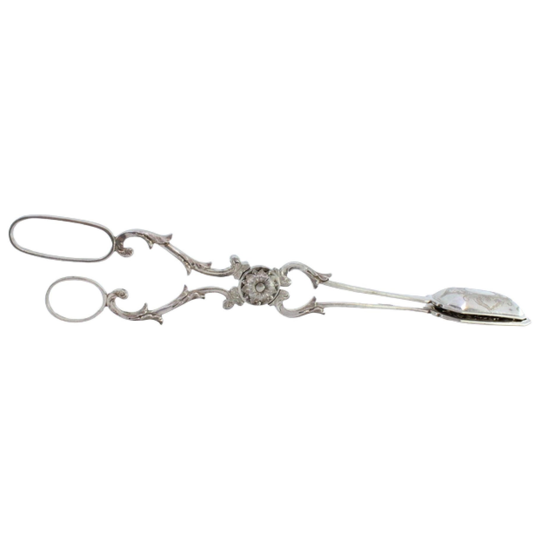 Salad, bread or sauce tongs in scalloped silver