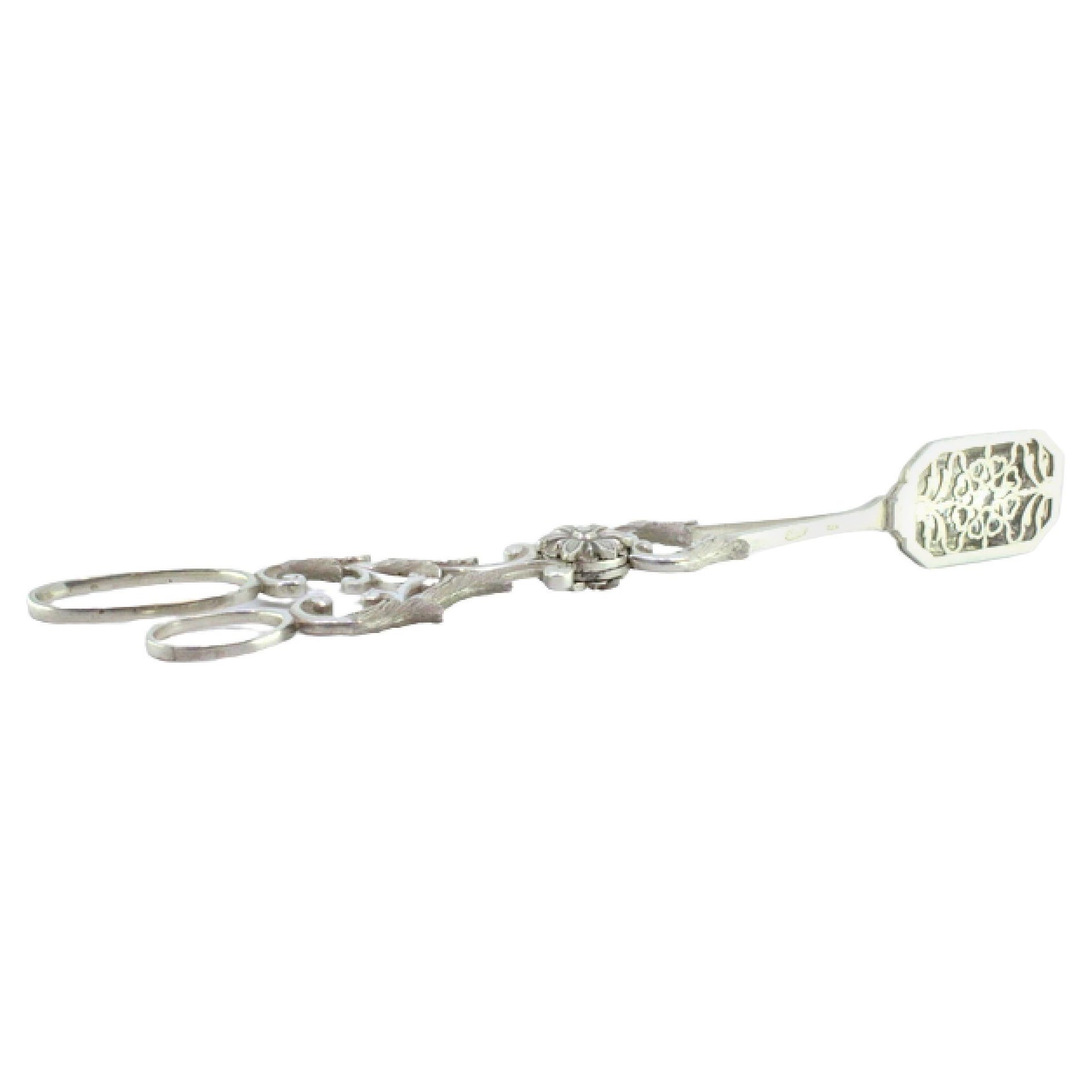 Salad, bread or sauce tongs in scalloped silver