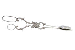 Salad, bread or sauce tongs in scalloped silver