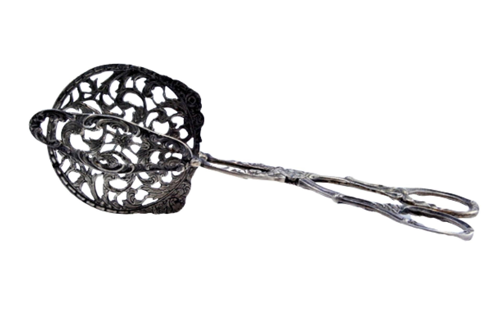 Salad or bread tongs in cut-out silver with raised handles For Sale